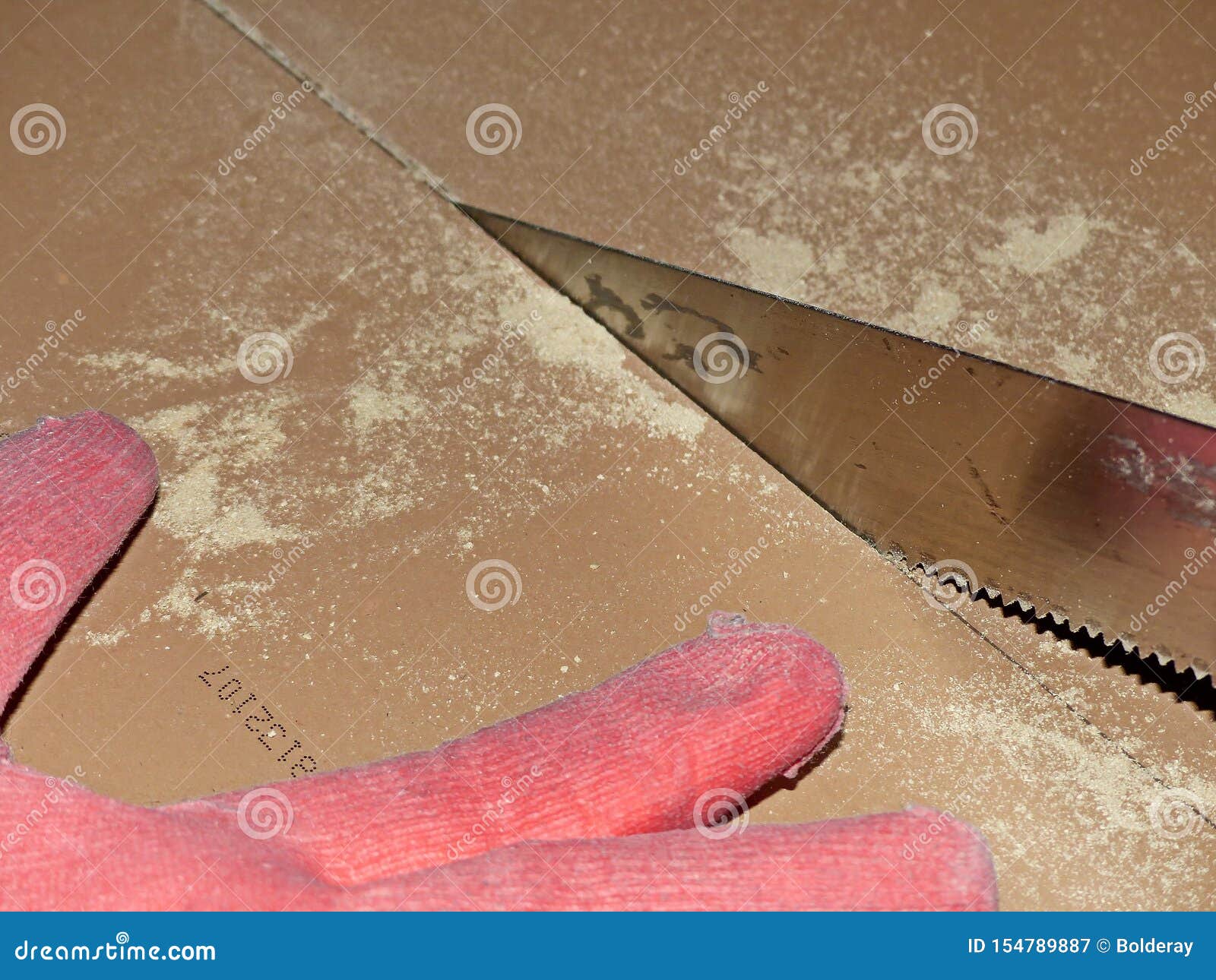 Cut The Laminate By Hand With A Small Hacksaw The Sheet Of A Hand
