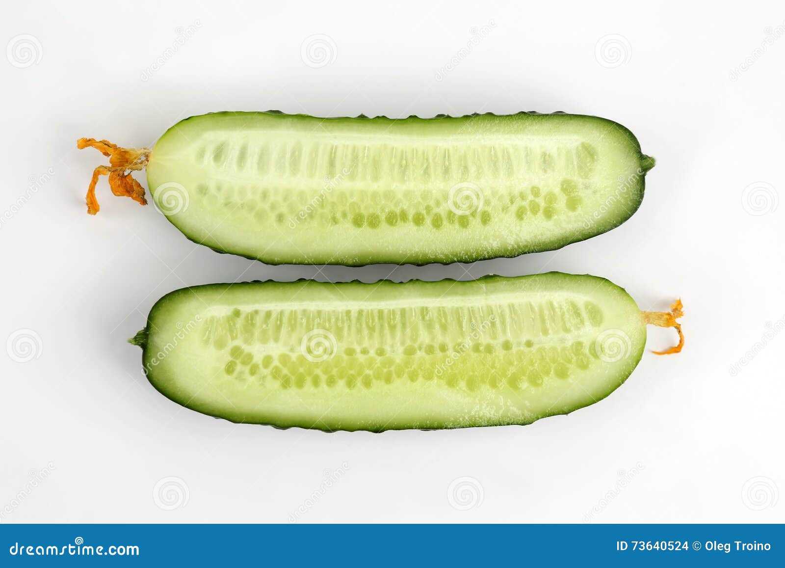 Cut Lengthwise the Cucumber on the White Background Stock Photo Image