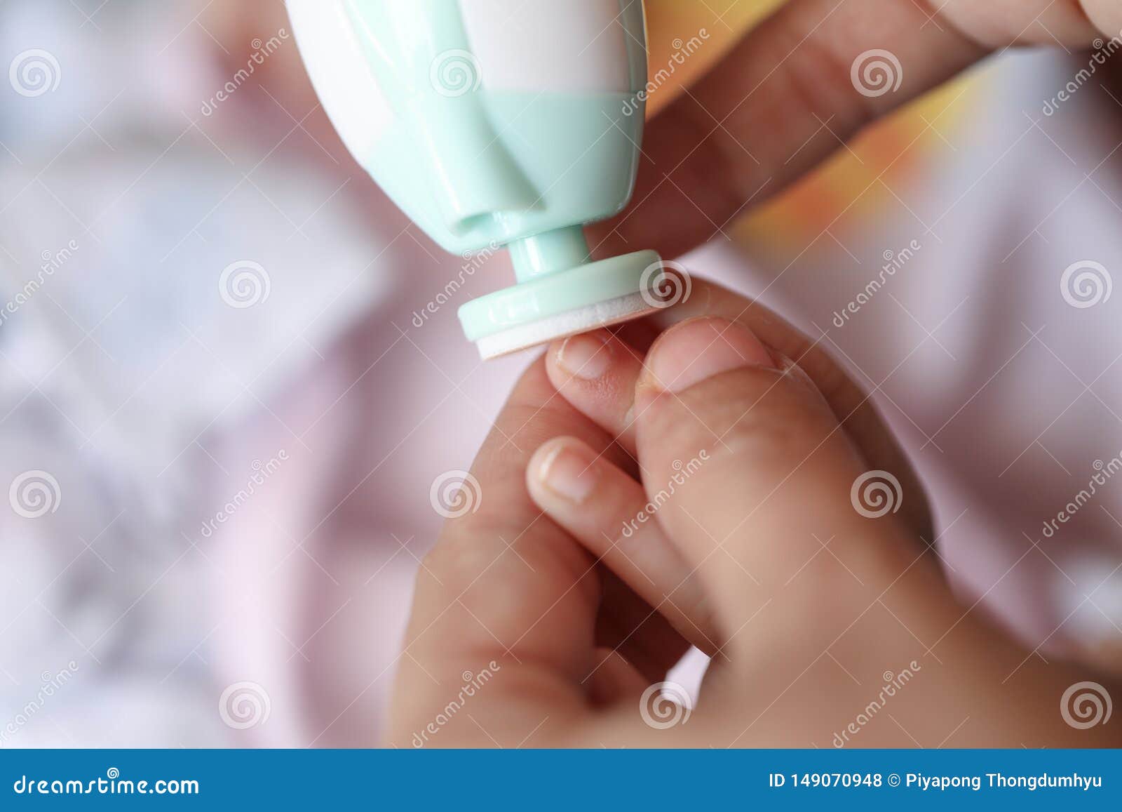 Mother Filling Baby Nails Using Automatic Baby Nail File Machine. Stock Photo - Image of child, beautiful: 149070948 Mother Filling Baby Nails Using Automatic Baby Nail File Machine. Stock Photo - Image of child, beautiful: 149070948