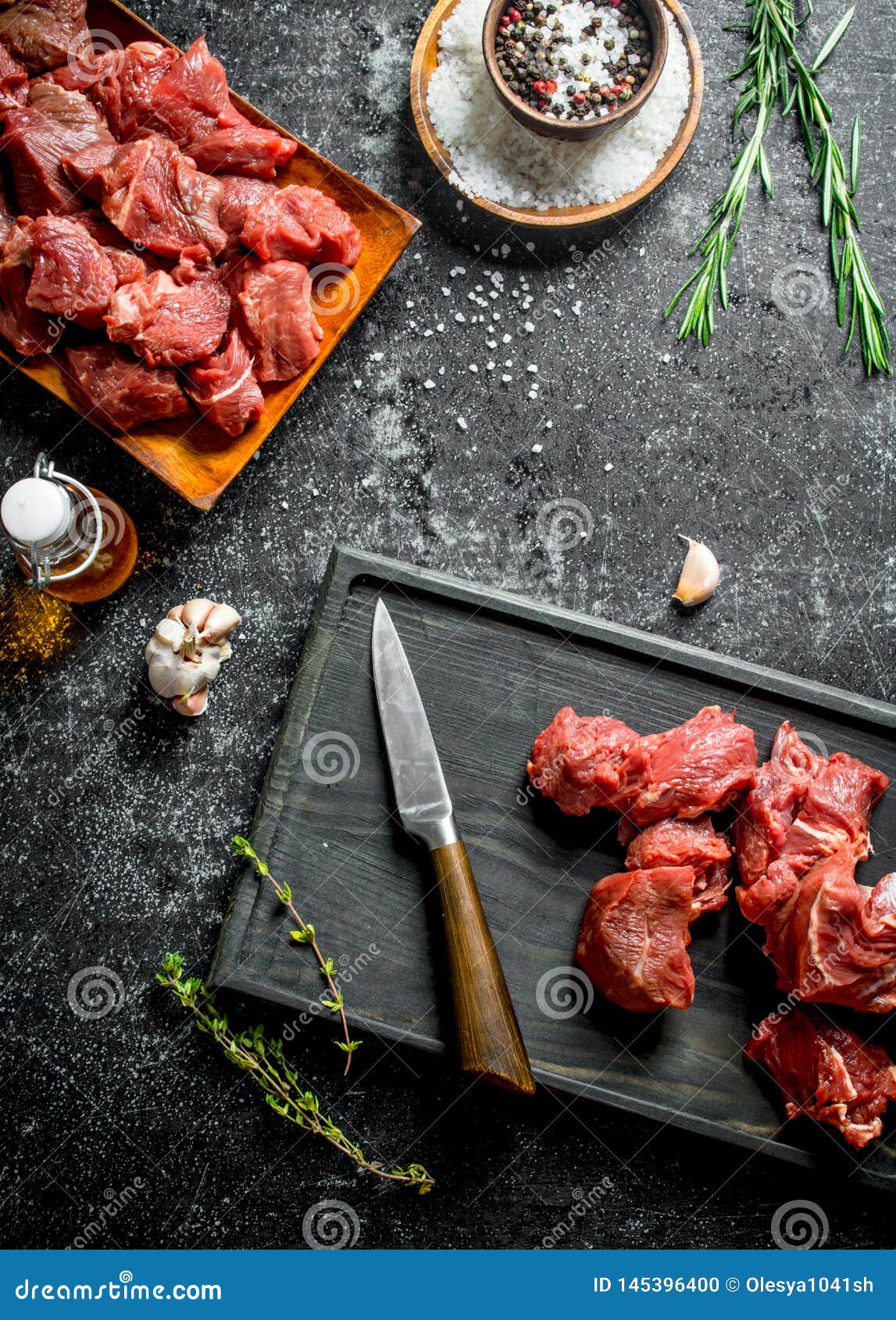 Cut Raw Beef on a Cutting Board and on a Plate Stock Photo Image of