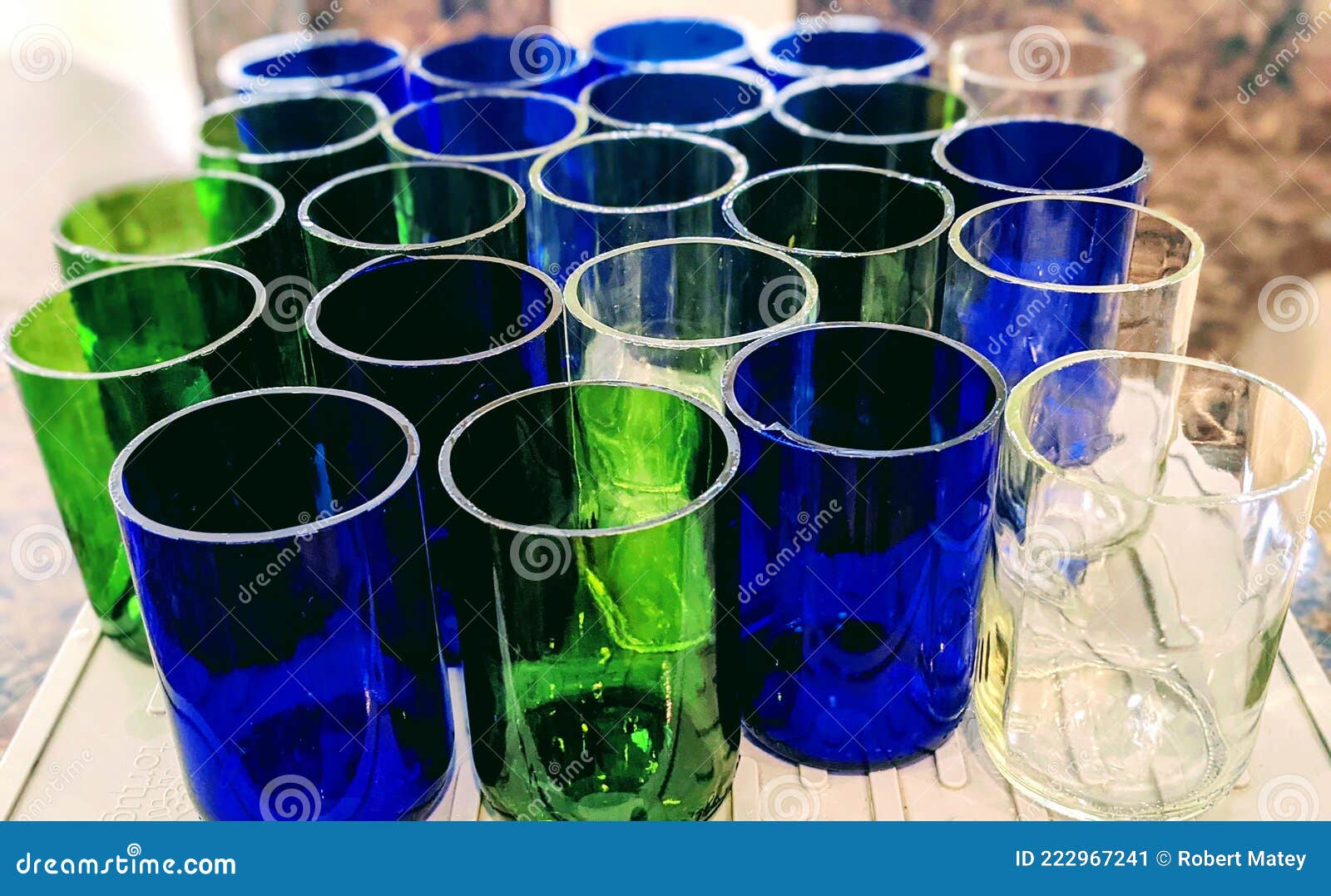https://thumbs.dreamstime.com/z/cut-recycled-glass-wine-bottles-ready-to-be-made-drinking-glasses-candles-diamond-green-blue-clear-recycle-222967241.jpg