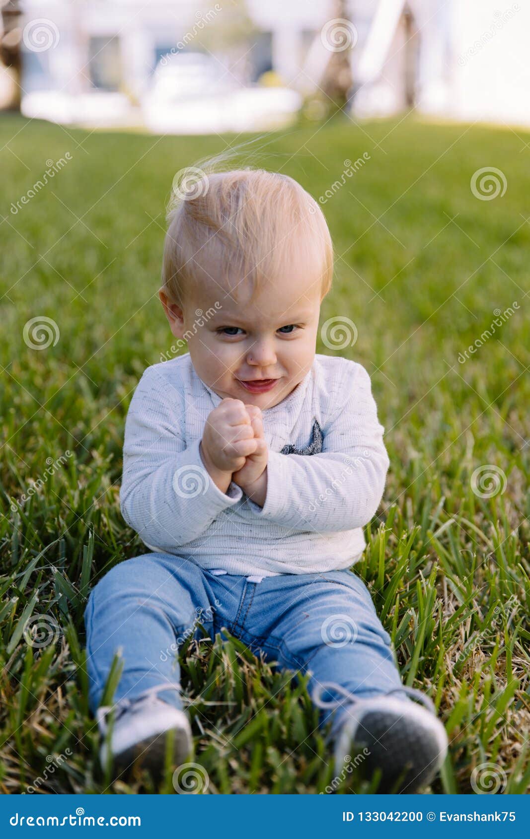 Cute and Adorable Young Toddler Baby Boy Playing in the Backyard Green ...