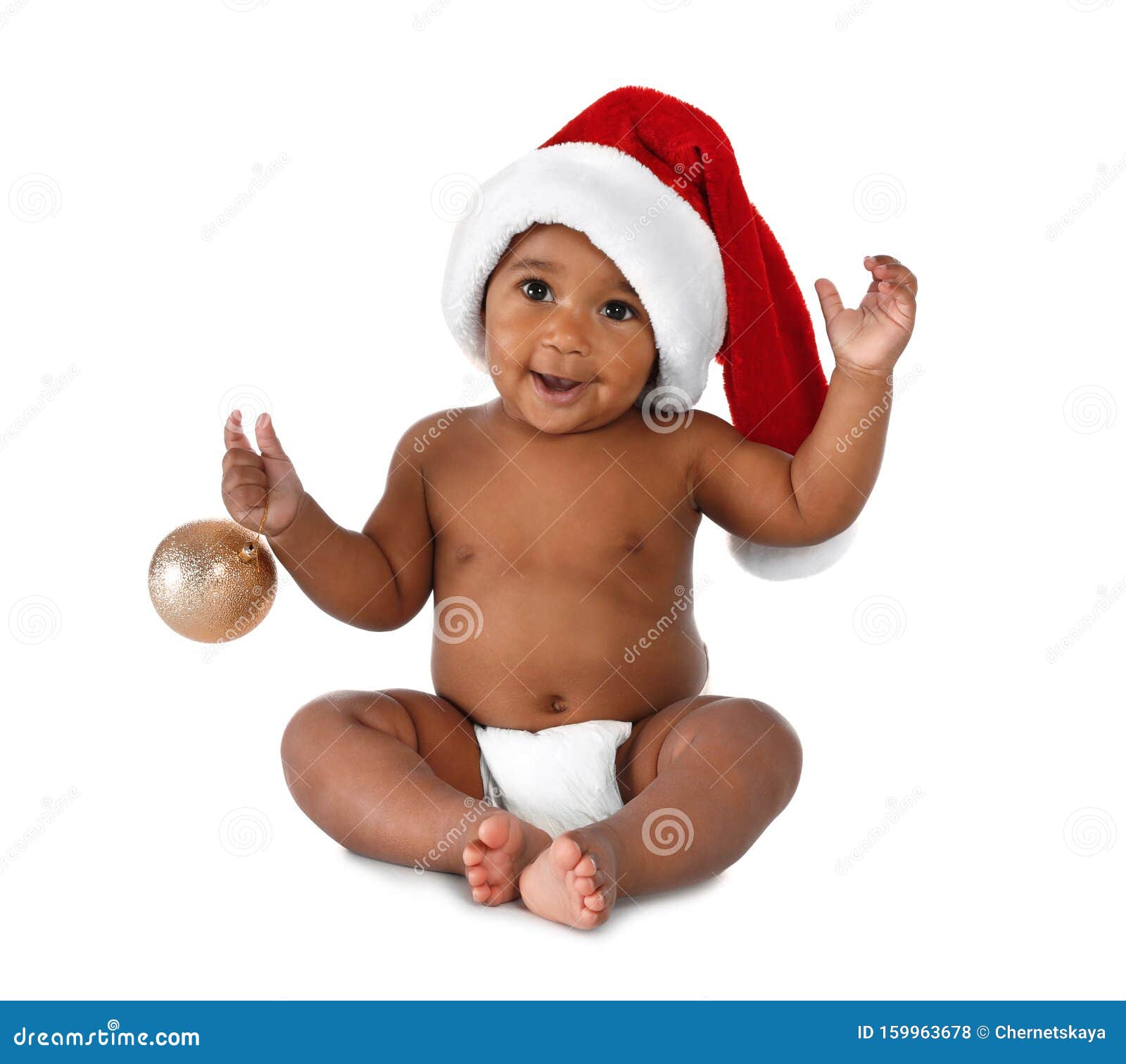 Cute African-American Baby Wearing Santa Hat with Christmas Decoration