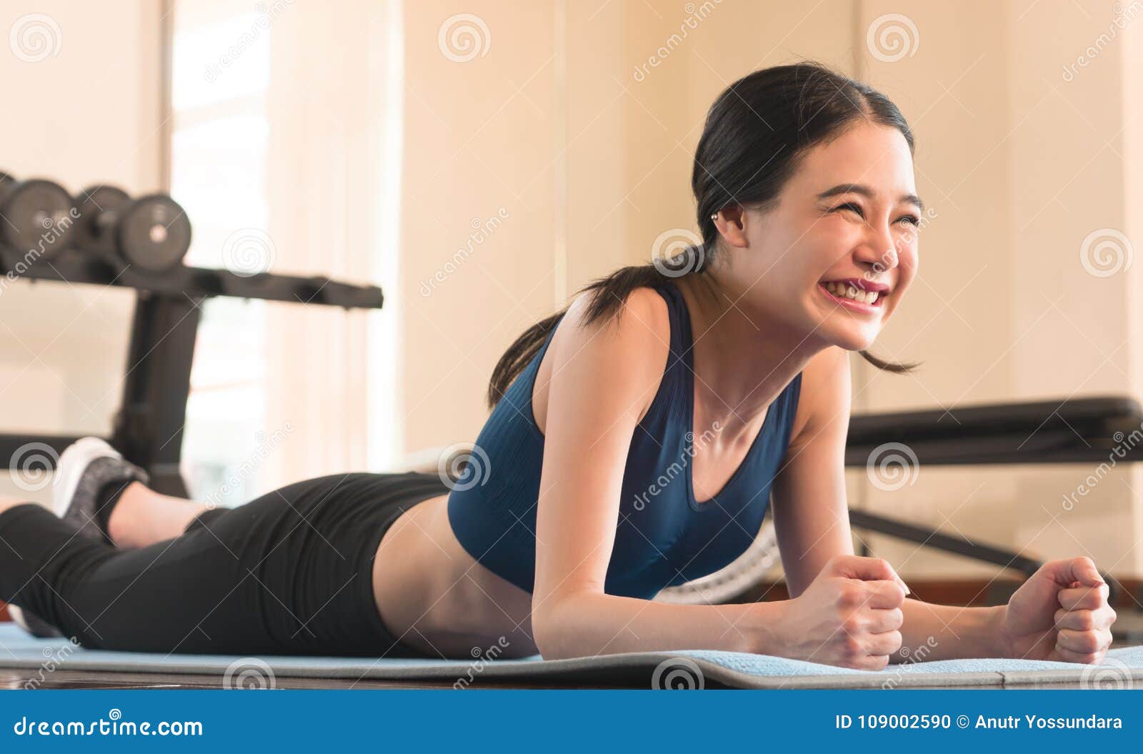 Asian Girl Laughing while Working Out in the Gym Stock Photo - Image of ...