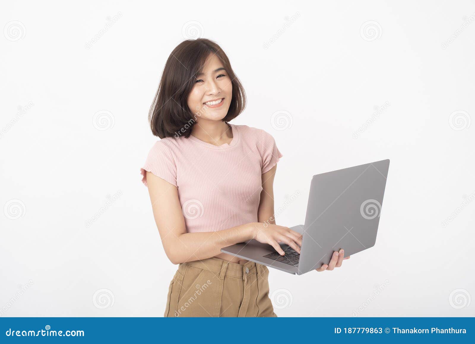 Cute Asian Teen Woman Is Working With Computer On White Background Stock Photo Megapixl