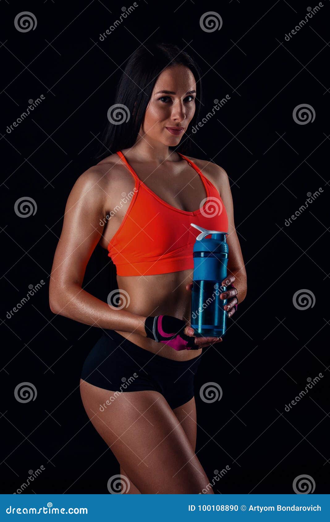 Cute Athletic Girl in Sportswear Relaxing after Workout with Shaker  Isolated Over Black Background. Healthy Young Woman Drinks Stock Photo -  Image of fitness, healthy: 100108890