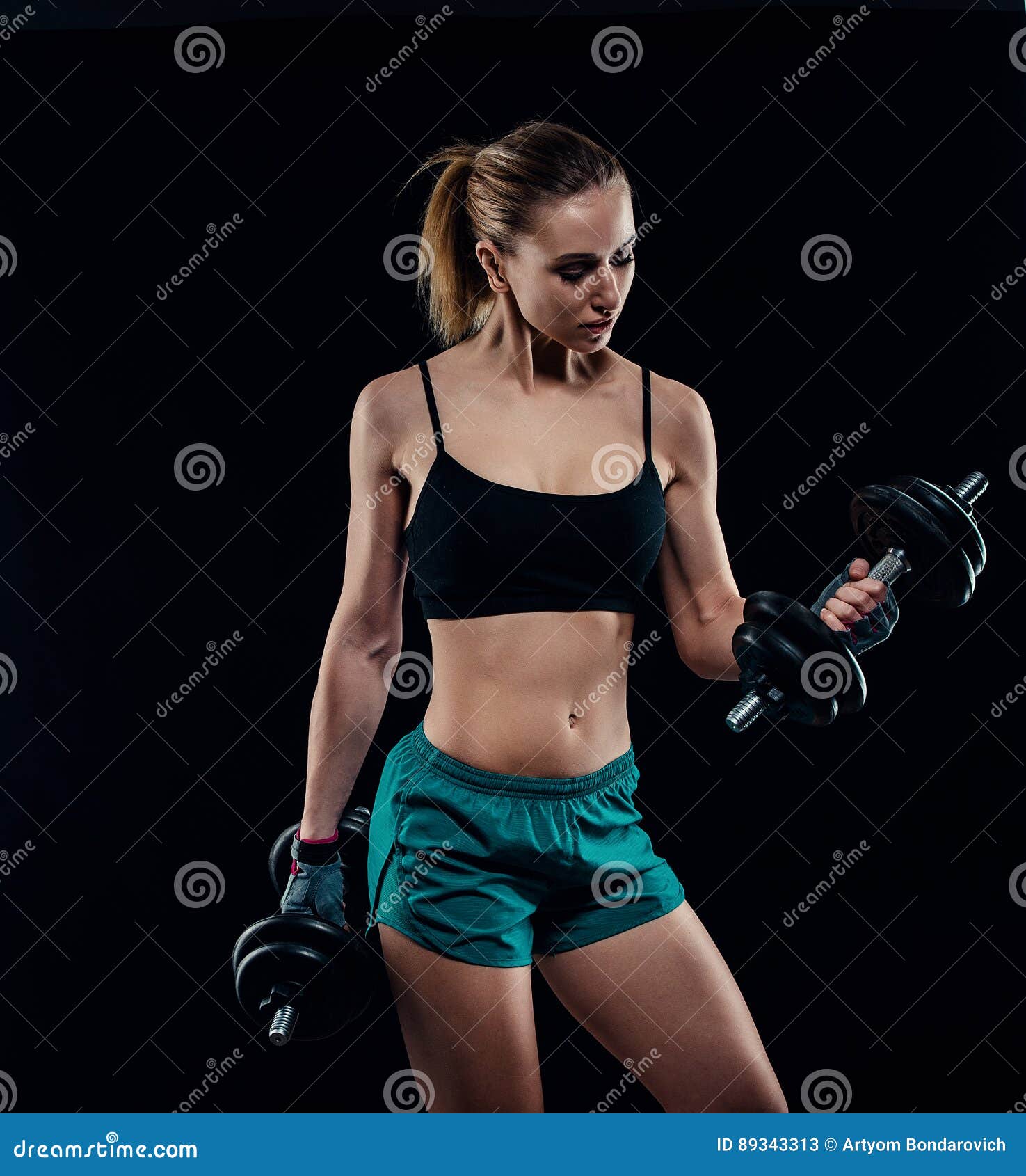 Cute Athletic Model Girl in Sportswear with Dumbbells in Studio Against  Black Background. Ideal Female Sports Figure Stock Image - Image of body,  heavy: 89343313