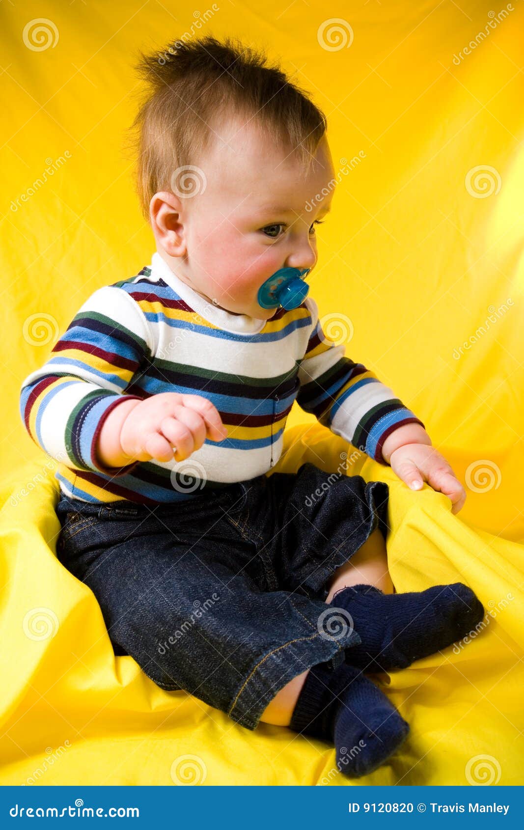 Cute Baby Boy. A portrait of a cute five month old baby boy. Shallow depth of field.