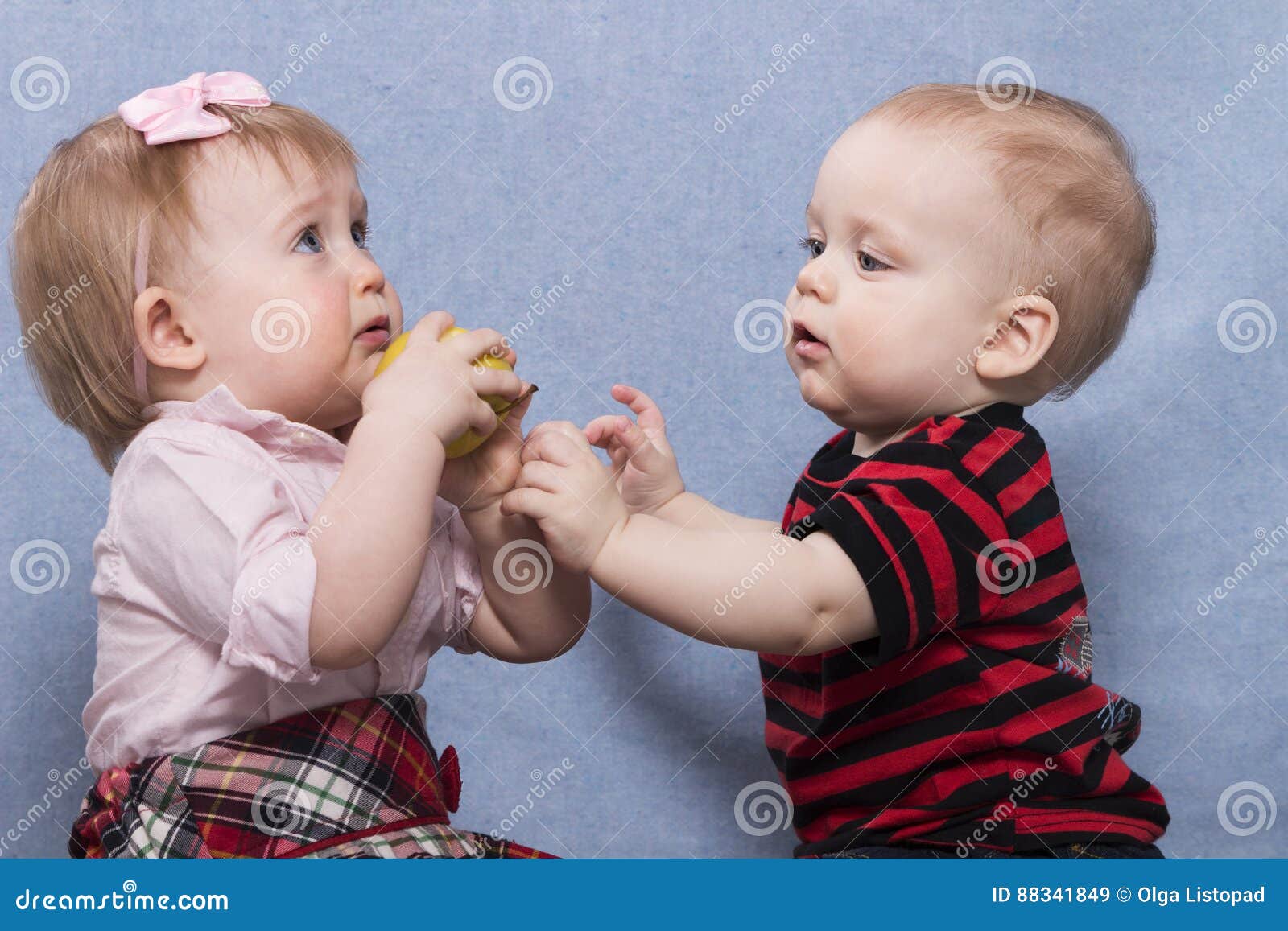 Cute Baby Boy and Lovely Baby Girl Playing Together Stock Image ...
