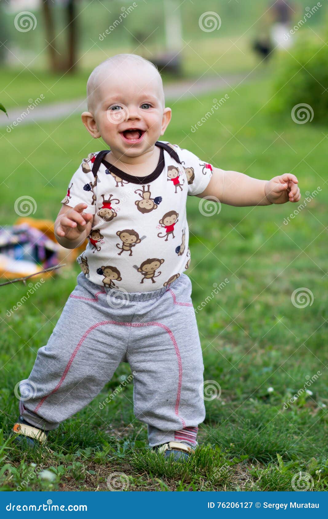 Cute Baby Boy Playing and Laughing in the Park. Summer is Around a Lot ...