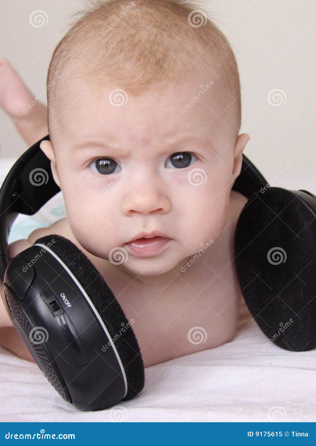 Cute baby with earphones stock image. Image of audio, expression 9175615