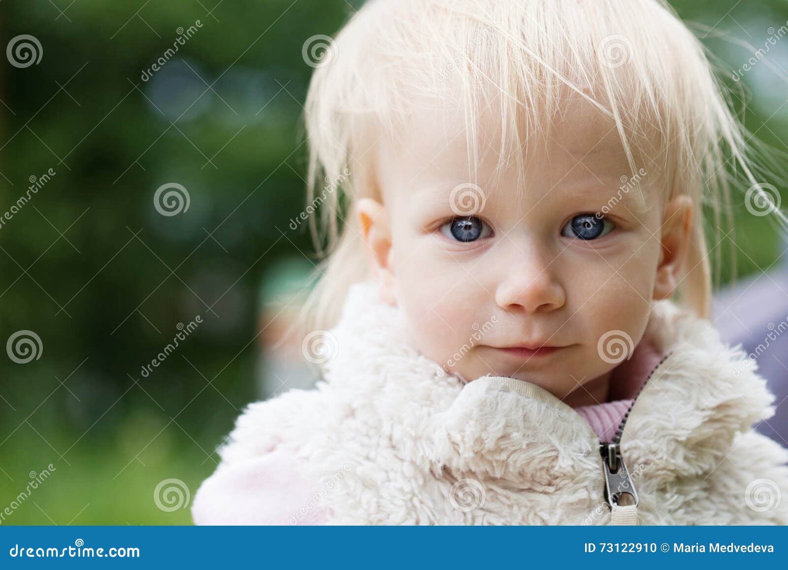 Cute Baby Girl With Blonde Curly Hair Outdoors Stock Photo Image