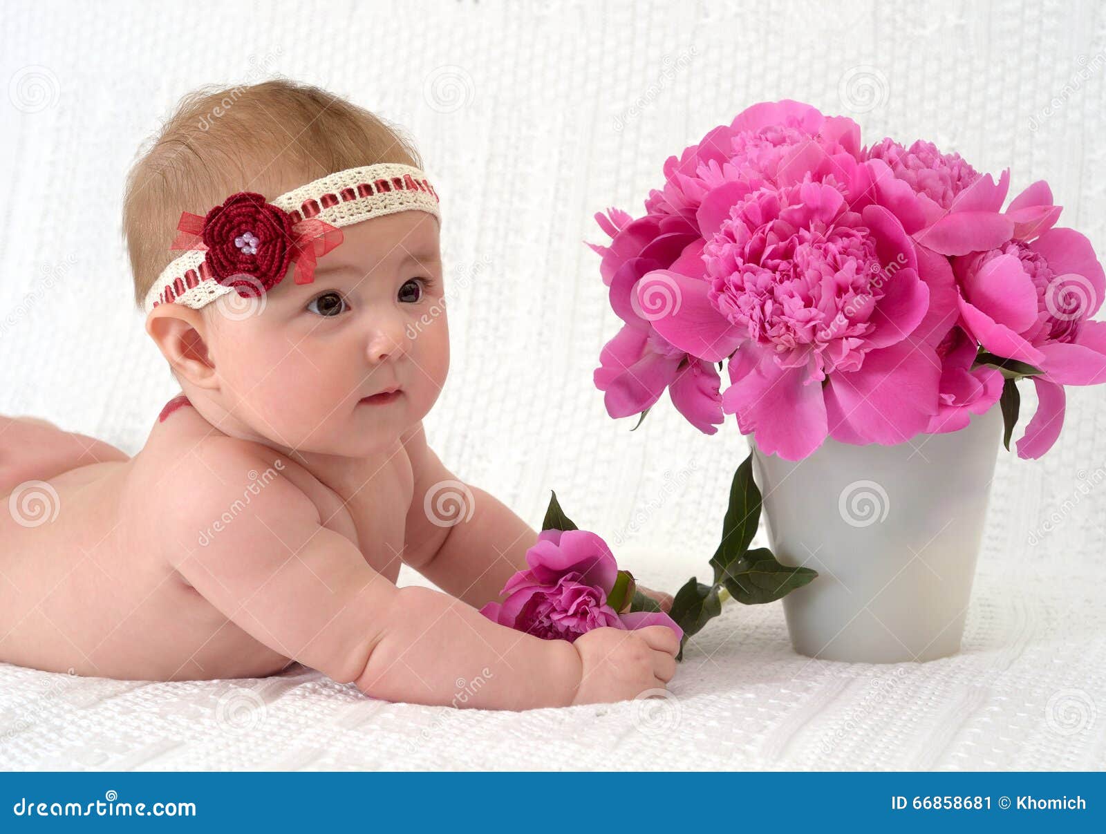 baby with flowers