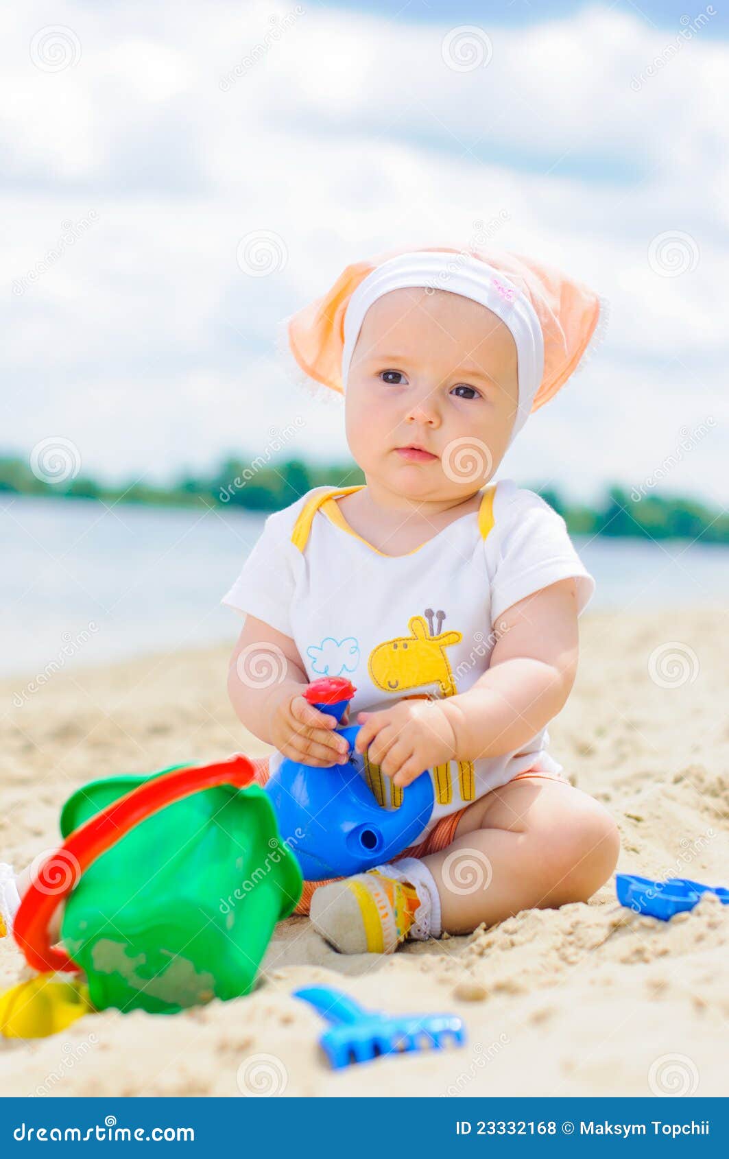 Cute Baby Girl Playing On The Beach With Sand Stock Photo Cute Baby Girl Playing On The Beach With Sand Stock Photo