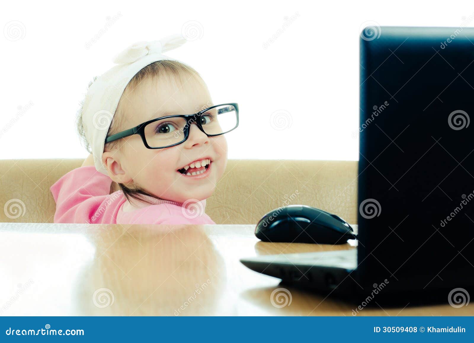 Cute Baby with Glasses Looking into the Laptop Stock Photo Image of