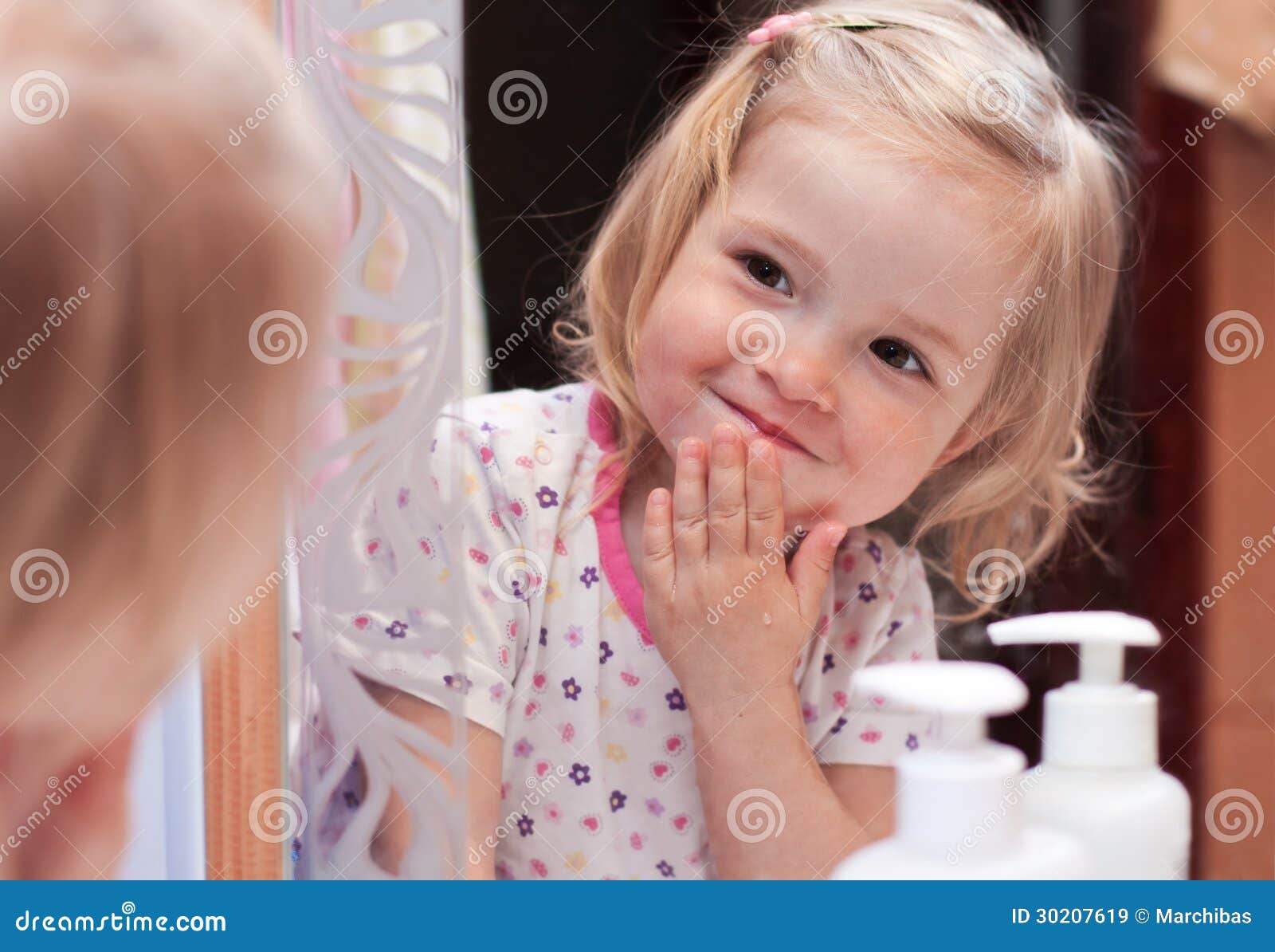 Cute baby washes his face stock image. Image of childhood 30207619
