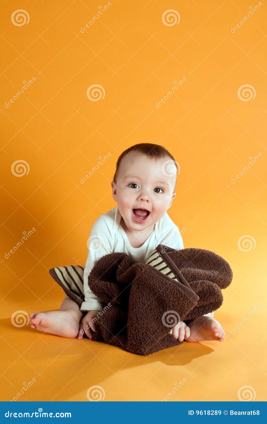 Cute baby on yellow stock image. Image of baby, cute, bright 9618289