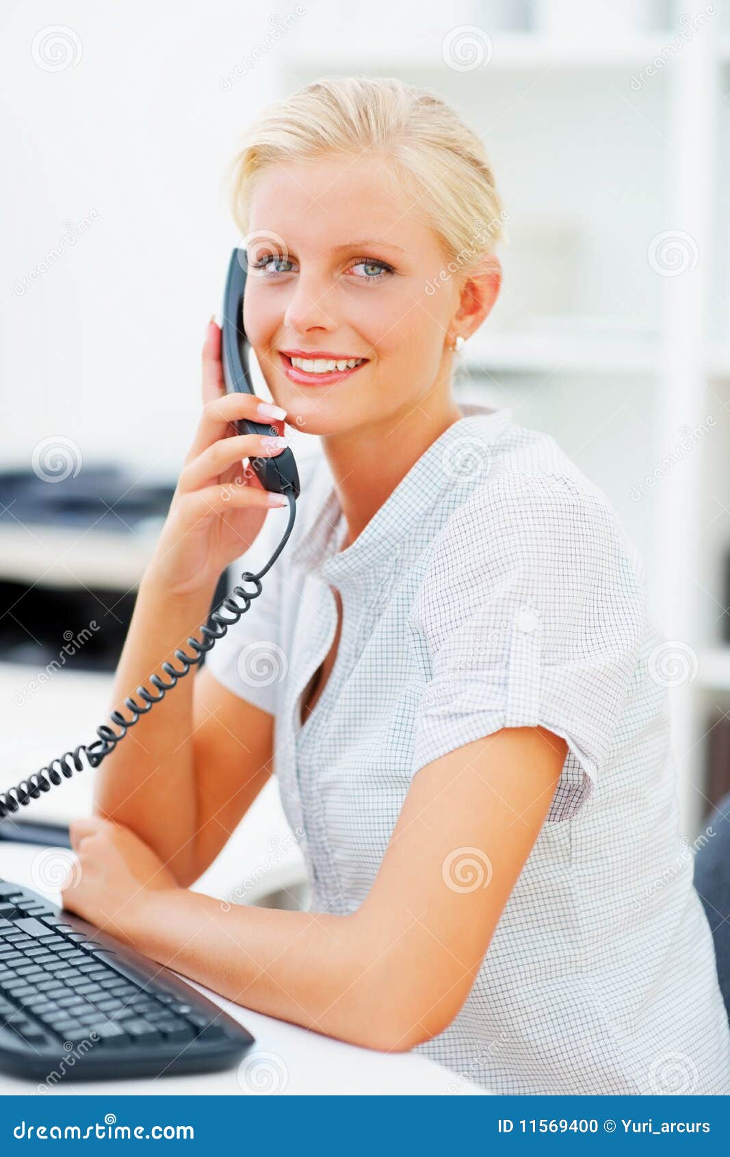 Cute Blond Secretary Talking on a Phone Stock Photo Image of person