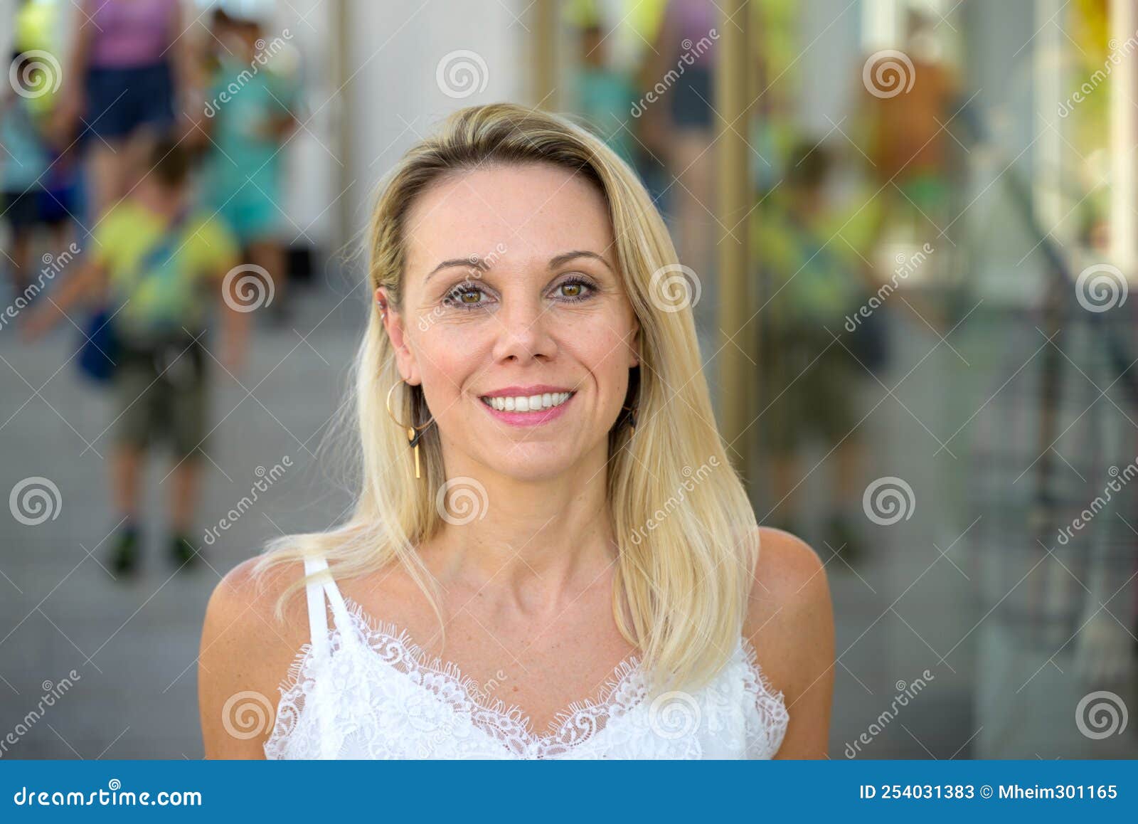 Cute Blond Woman With A Cheerful Happy Grin Stock Image Image Of Grin Woman 254031383