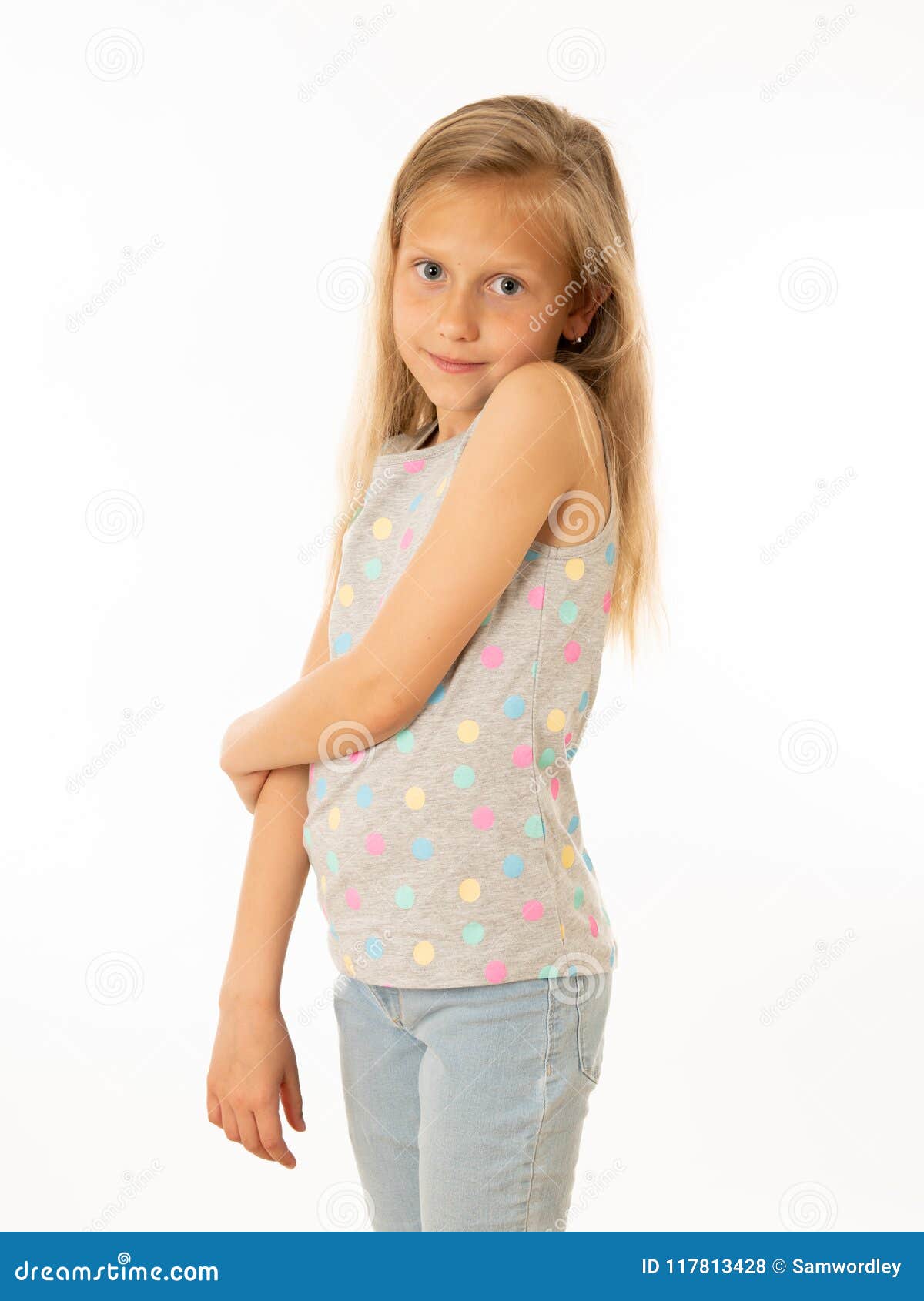 Cute Blonde Girl Looking Shy And Timid At The Camera On A White Background Human Emotions Stock