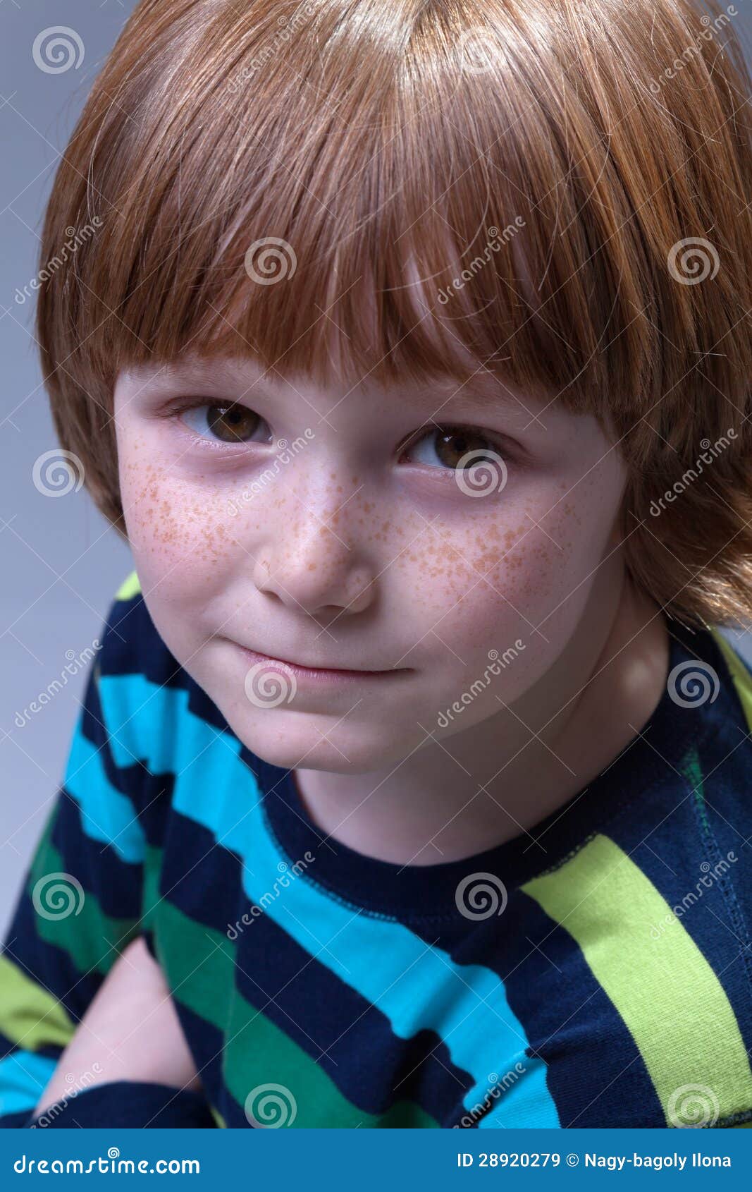 cute boy with freckles portrait