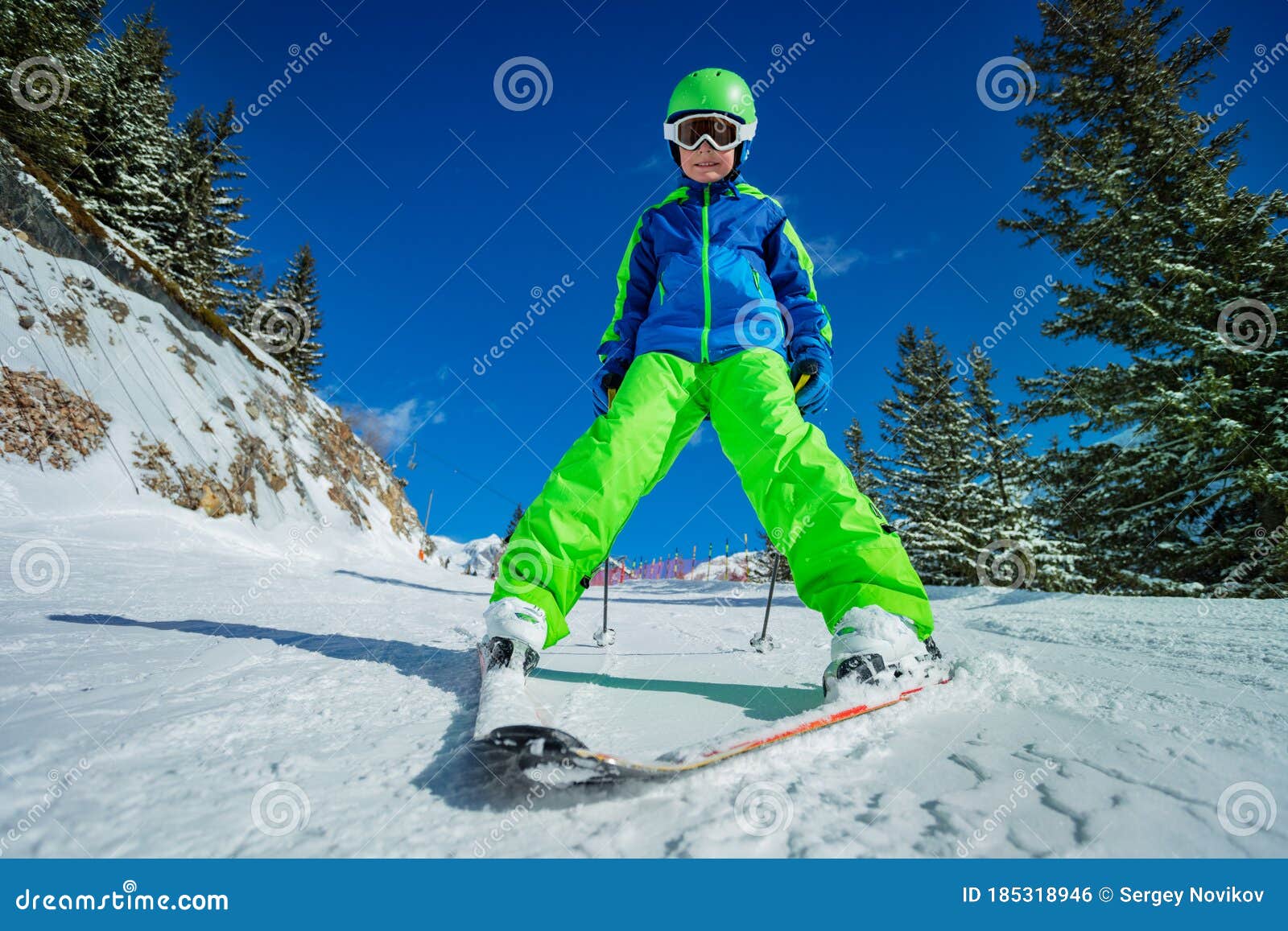 Cute Boy in Funny Ski Pose on Snowy Track Stock Photo - Image of