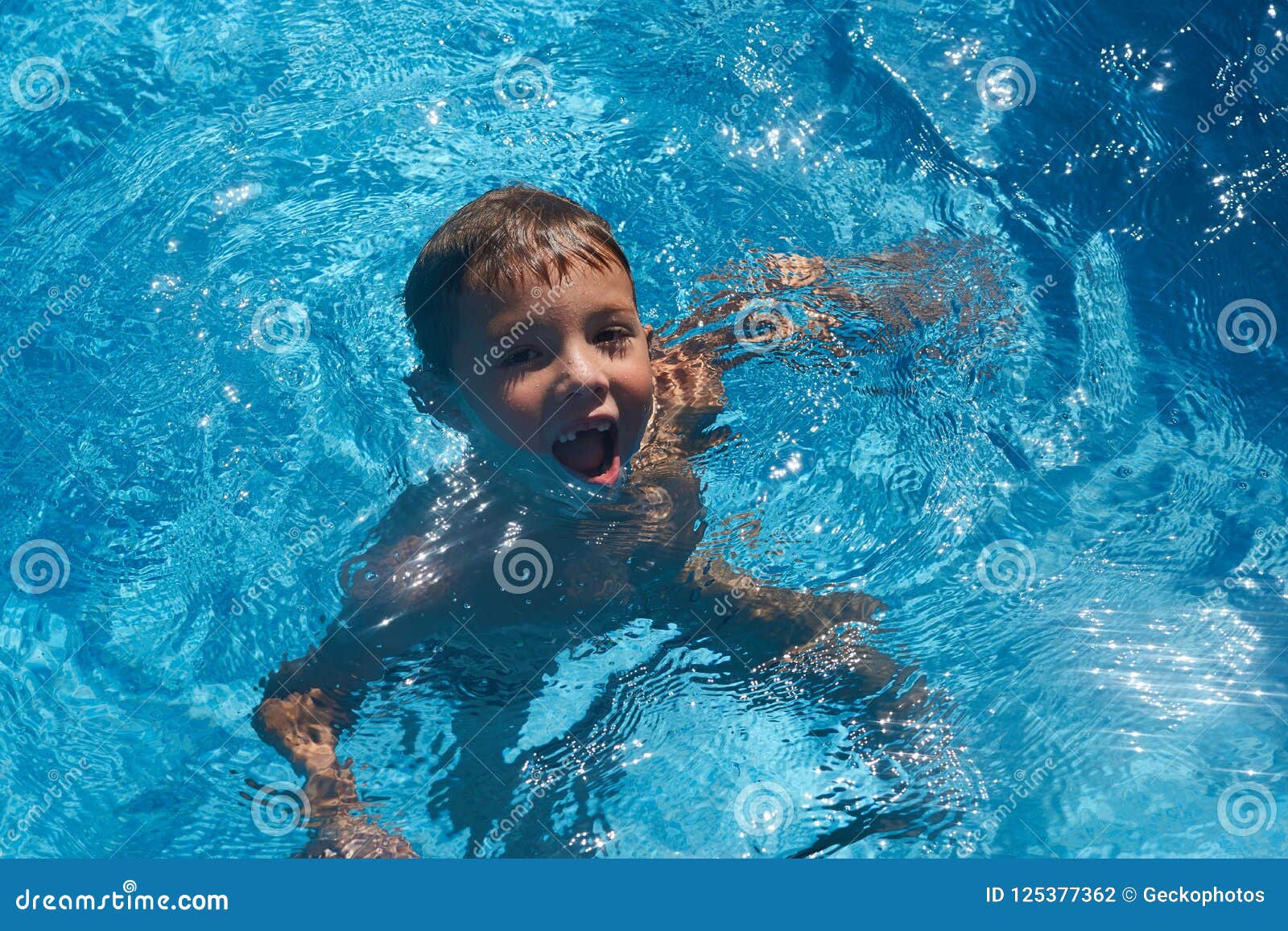 Cute Boy Having Fun In Swimming Pool Stock Photo Image Of Small Smile