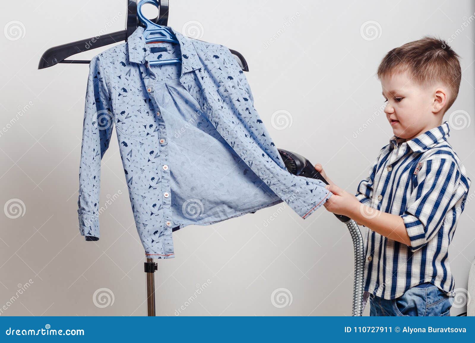 Cute boy stripped shirt stock image. Image of child - 110727911