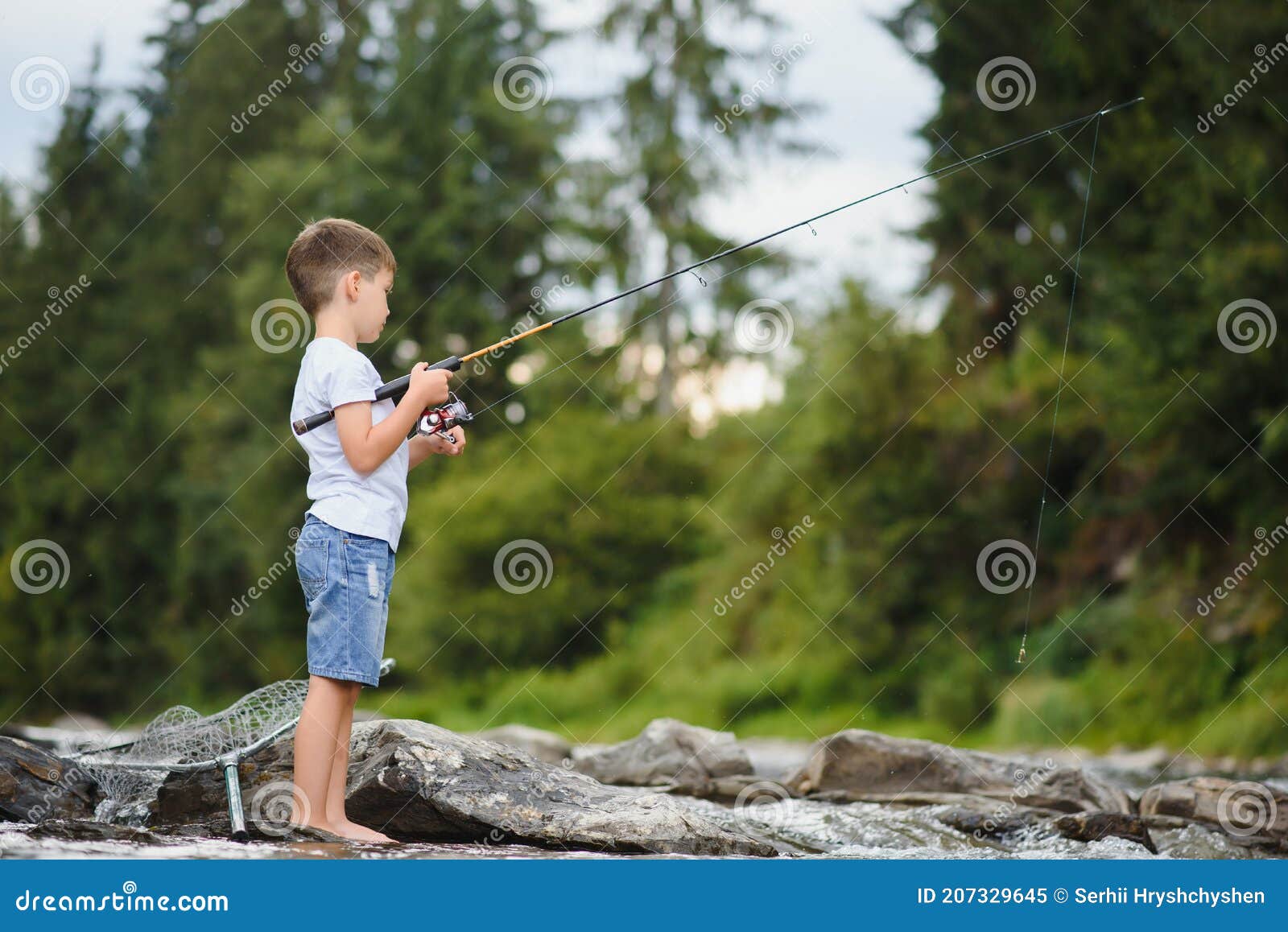 Cute Boy in White T Shirt Fishing in the River and Has Fun, Smiles.  Vacation with Kids, Holidays, Active Weekends Concept Stock Image - Image  of family, fish: 207329645