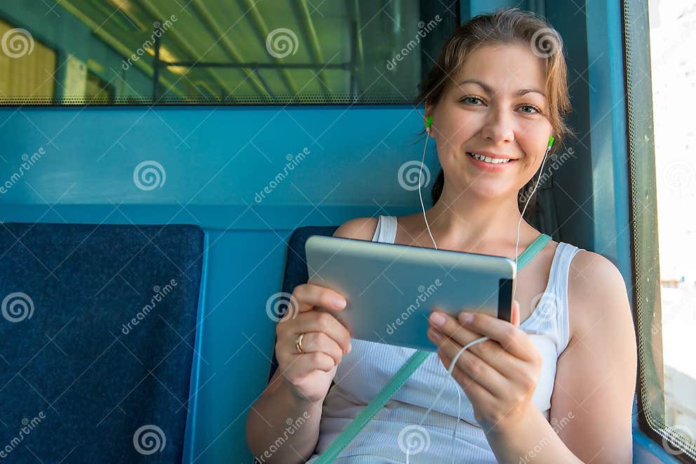 Cute Brunette With A Tablet In The Subway Stock Image Image Of Electronic Device 66121055