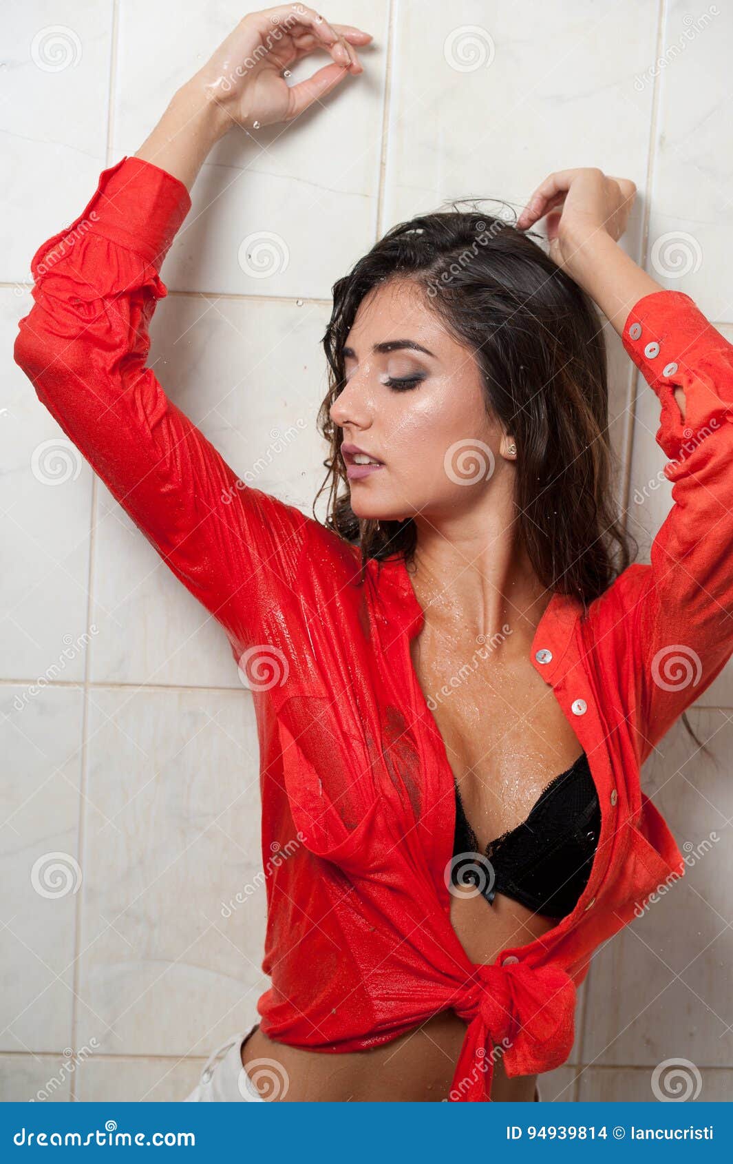 Cute Brunette Woman With Perfect Body Posing In Erotic Pose Under Shower With Wet Hair And