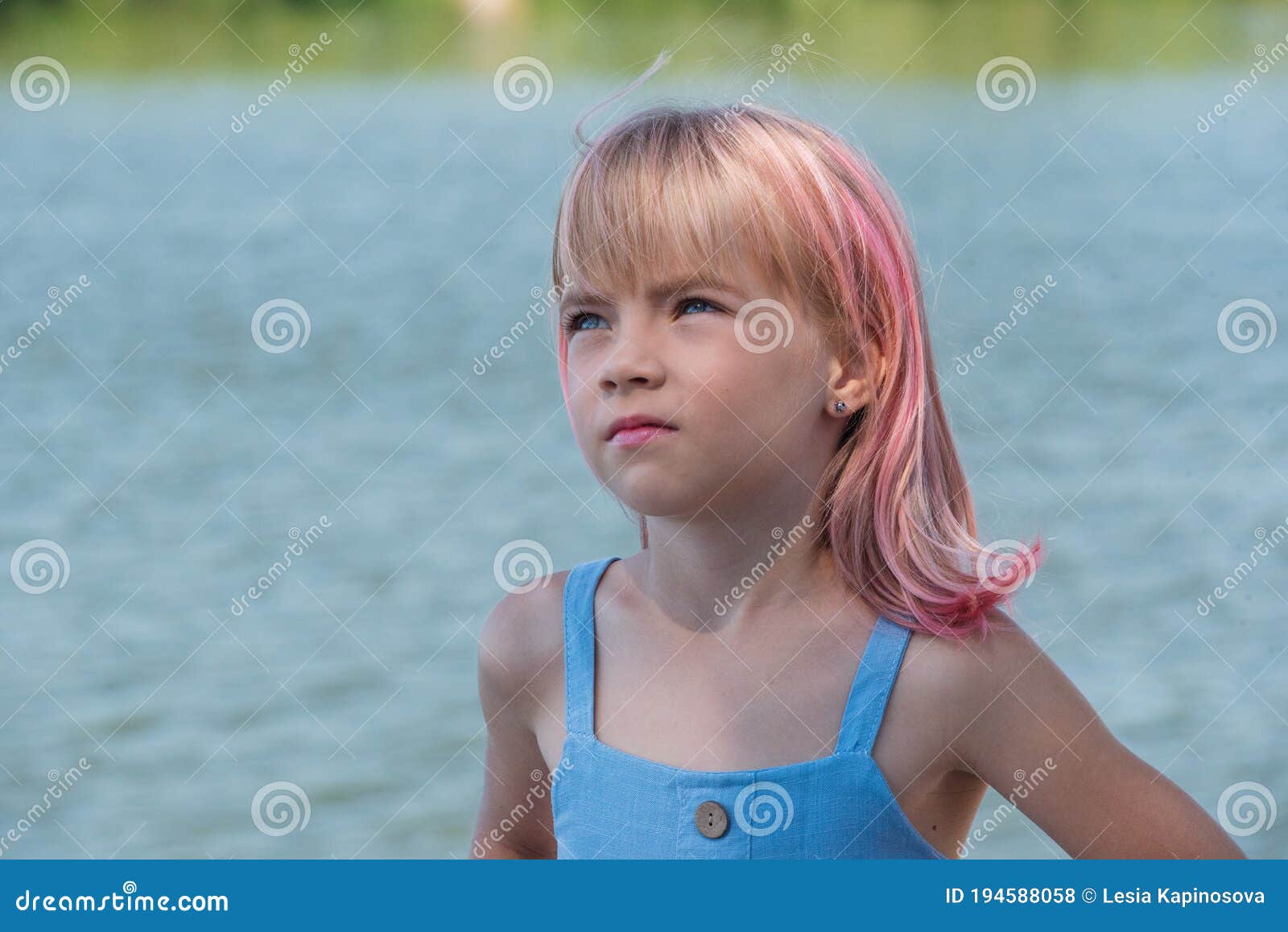 Cute Child Girl Portrait . Outdoor Portrait of Cute Little Girl in ...