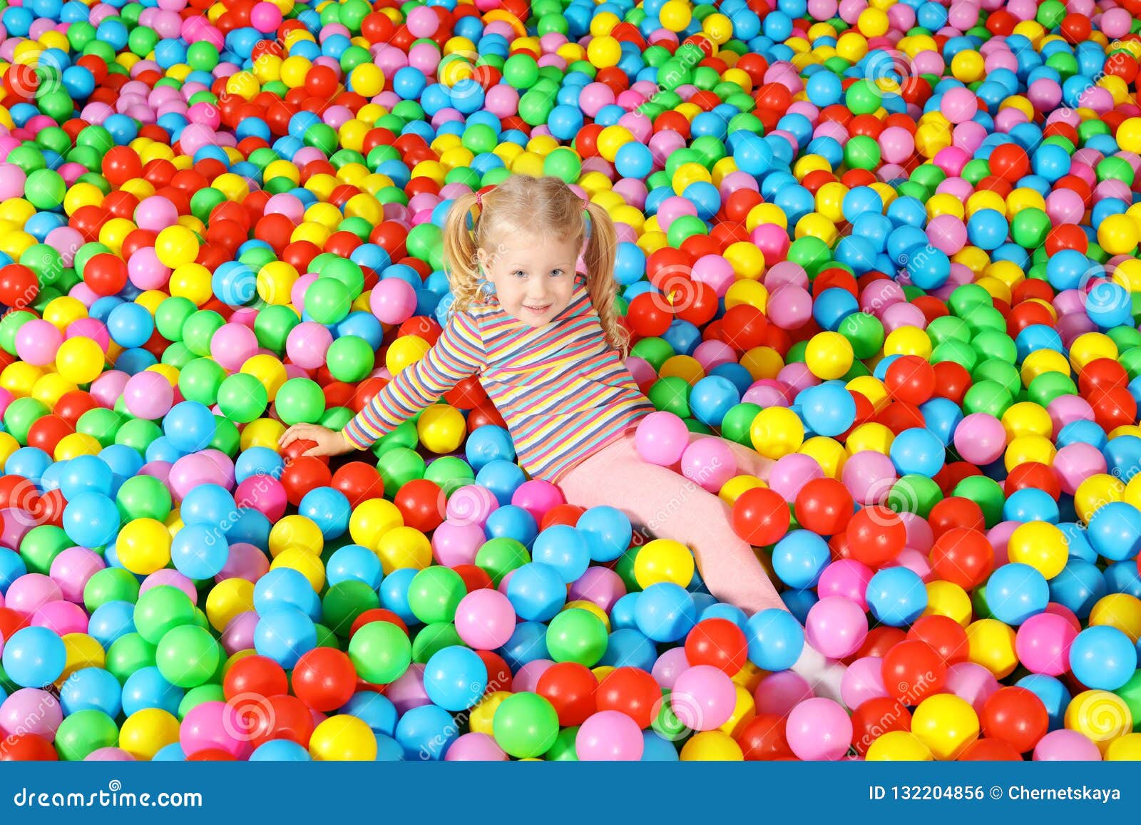 Cute Child Playing in Ball Pit Stock Photo Image of colorful