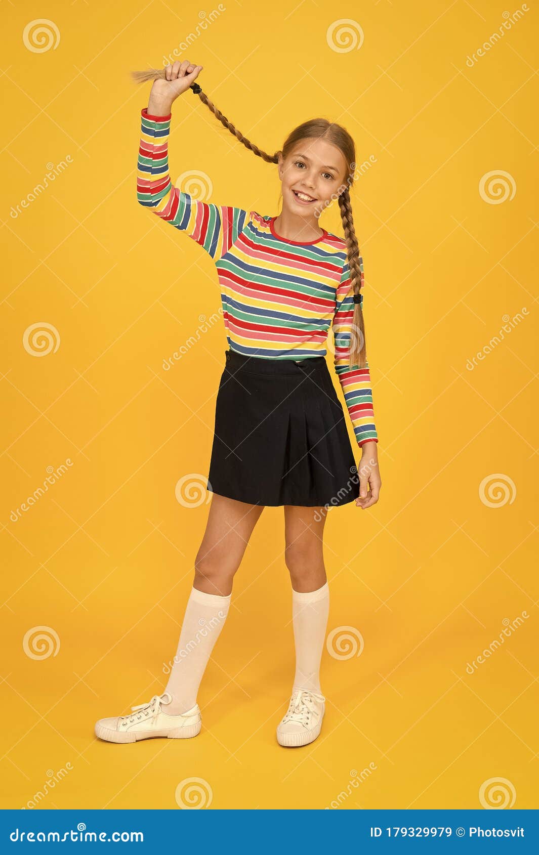 Emotional kids. Fashion shop. Must have accessory. Modern fashion. Kids  fashion. Girls long hair. Cute children same outfits. Trendy and fancy.  Little girls wearing rainbow clothes. Happiness Photos