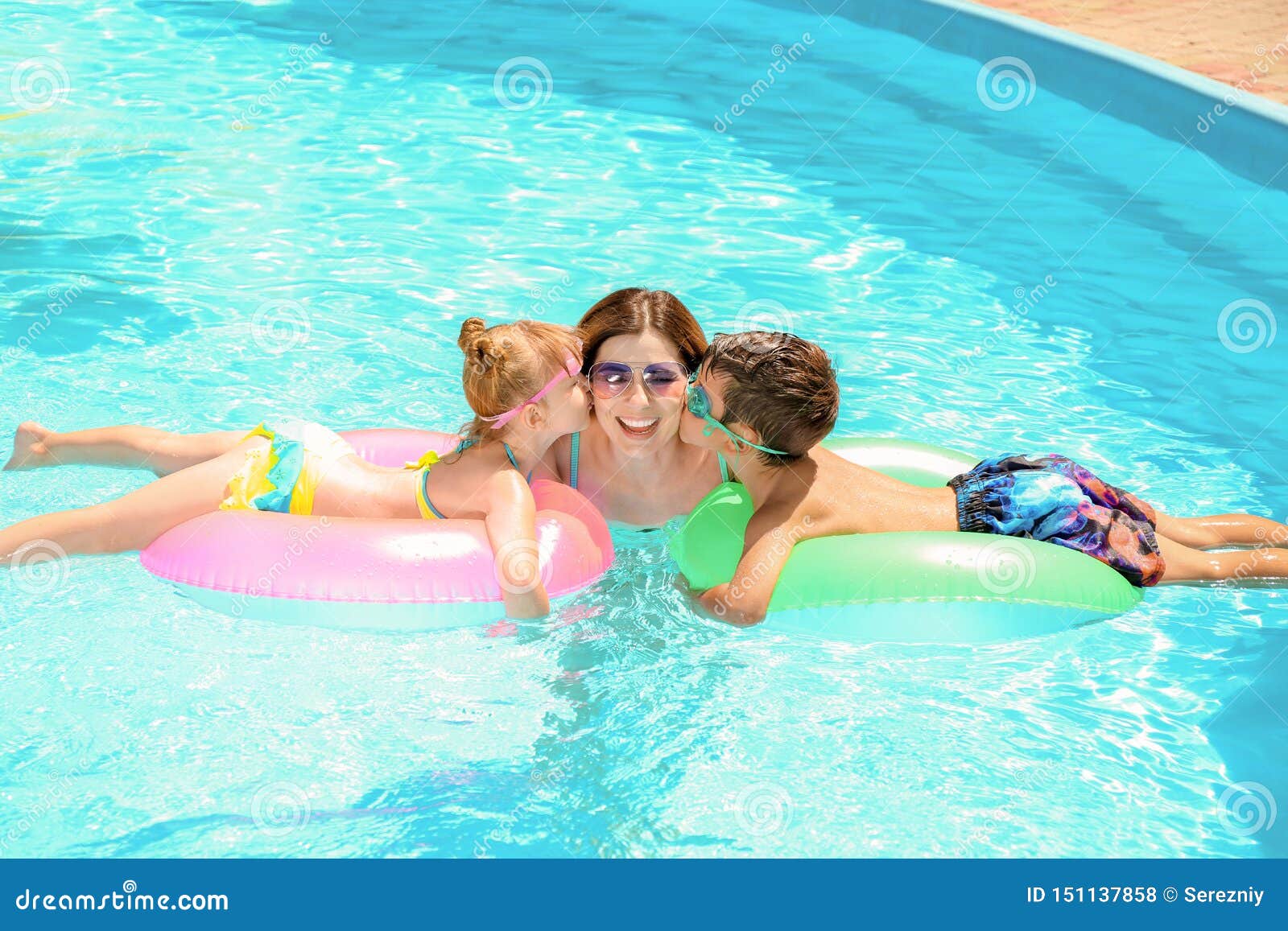 Girls Kissing In The Pool