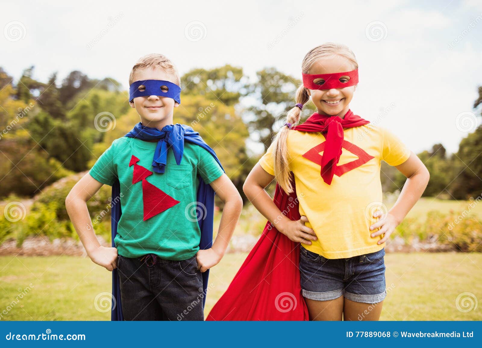 Cute Children Posing with Hands on Hips Stock Photo Image of green