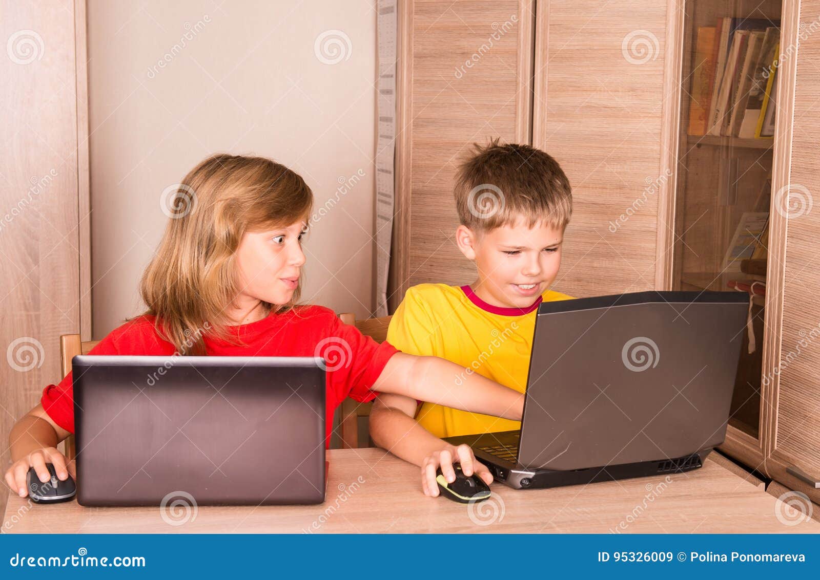 Very happy child playing game online with laptop stay at home. Asian boy  student online learning class study online video call teacher Stock Photo -  Alamy