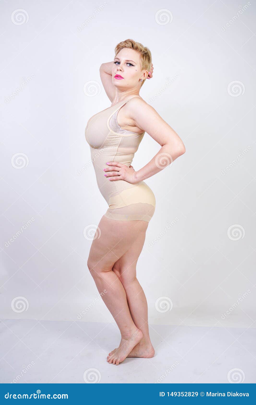 Cute Chubby Women Porn - Cute Chubby Girl with Short Hair and a Curvy Figure Dressed in Beige Tight  Shapewear on a White Background in the Studio Stock Image - Image of  collection, dressed: 149352829