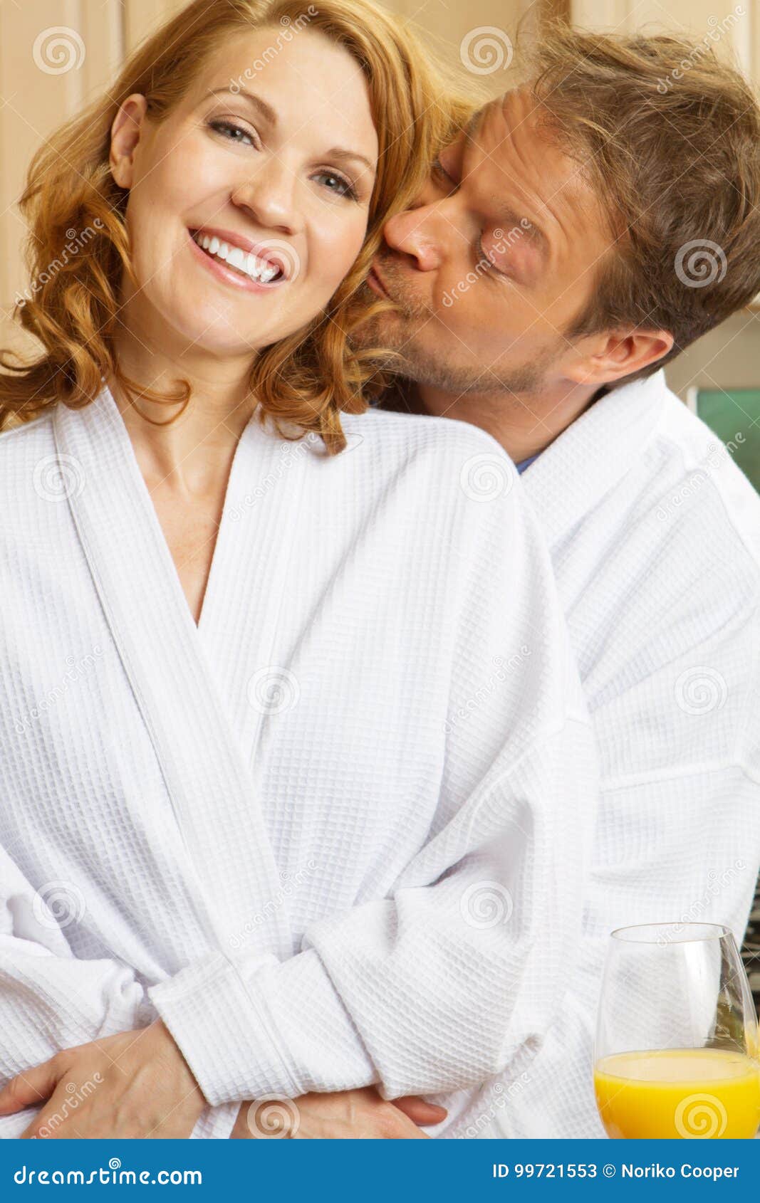 Cute couple in bath robes. stock image. Image of family 99721553
