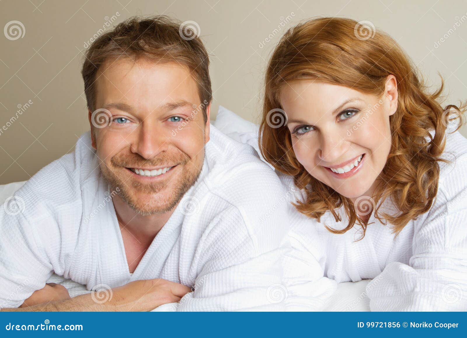 Cute couple in bath robes. stock photo. Image of smiling 99721856