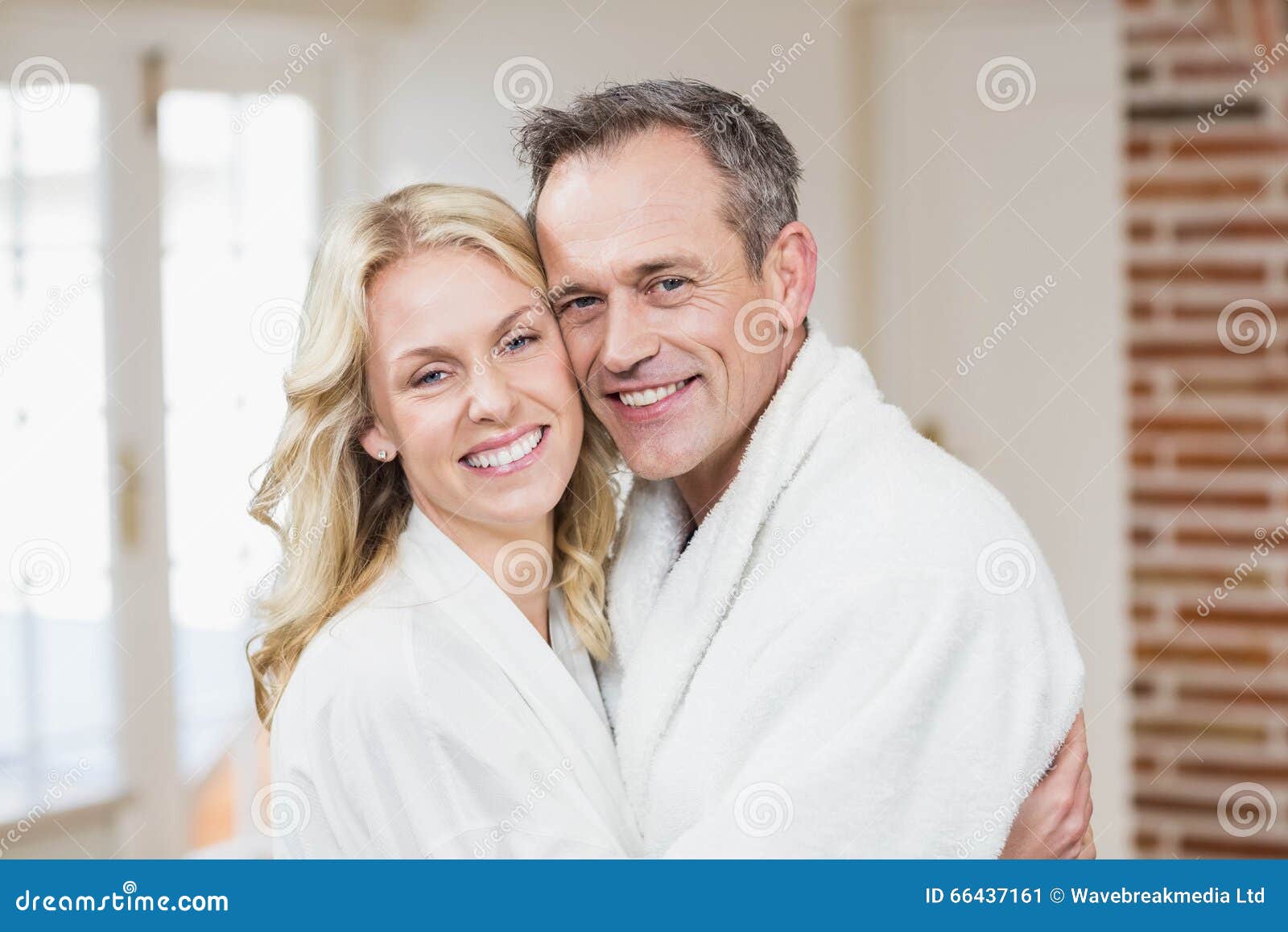 Cute Couple Cuddling in Bathrobes Stock Image Image of hugging, abode