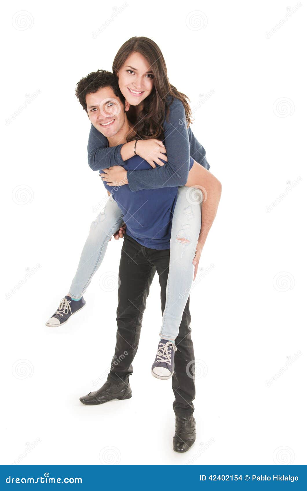 Cute Couple Hugging Boy Carrying Girl Stock Photo - Image of ...