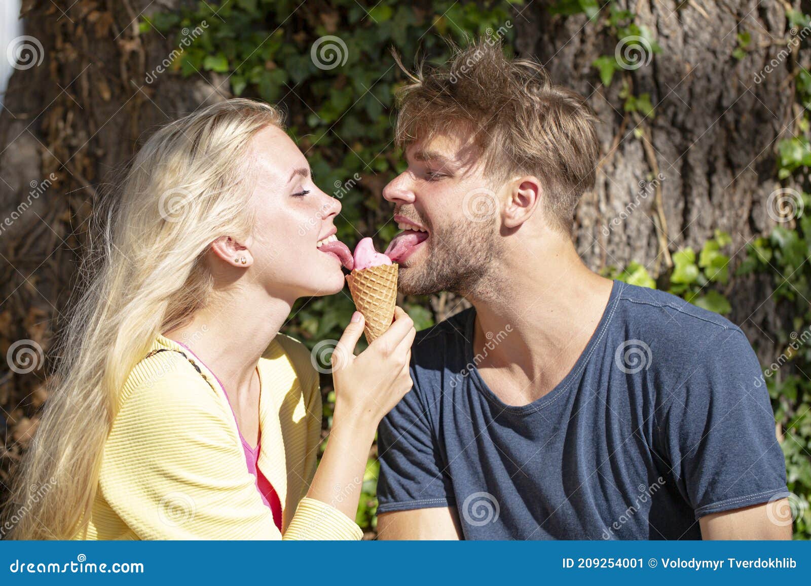 Cute Couple Romantic Dating and Eating Ice Cream. Young Pair ...