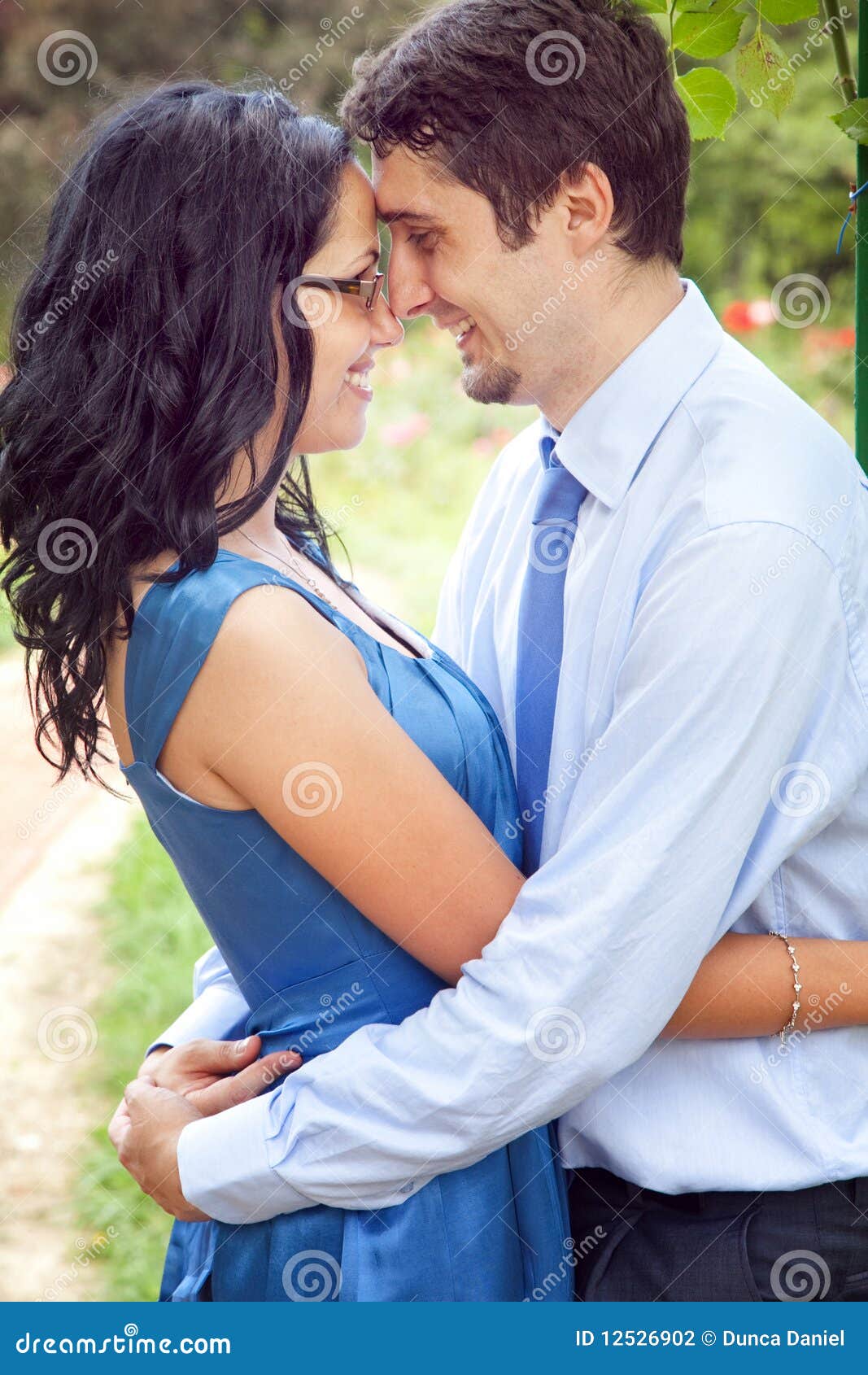 Cute Couple Sharing a Romantic Intimate Moment Stock Photo - Image of  outdoors, cuddling: 12526902