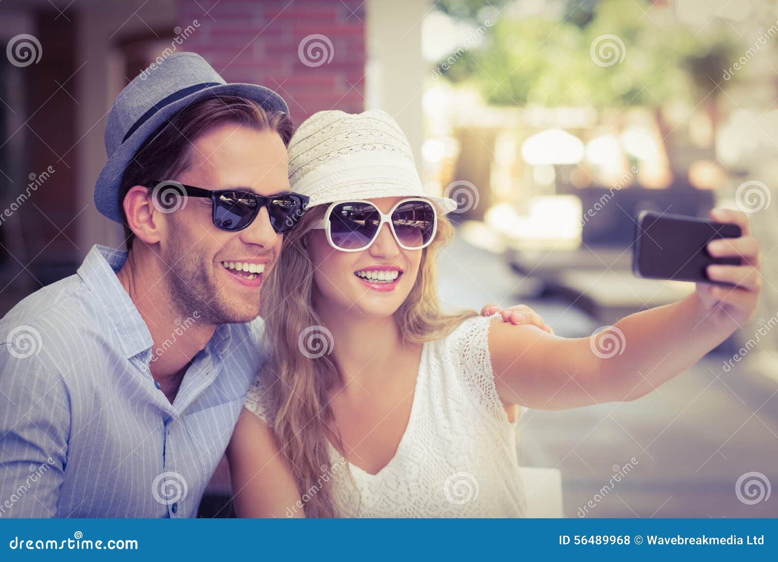 Couple Posing For Selfie During Enjoy Summer Day In The Park 14235172 Stock  Photo at Vecteezy