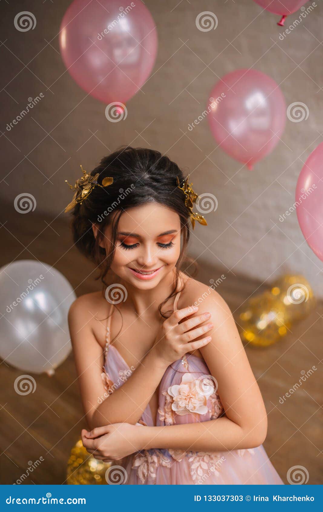 Cute Embarrassed Modest Petite Girl with Dark Hair and a Gold Rim Sits in a  Gorgeous Pink Peach Dress with Purple Color Stock Image - Image of balloon,  hair: 133037303