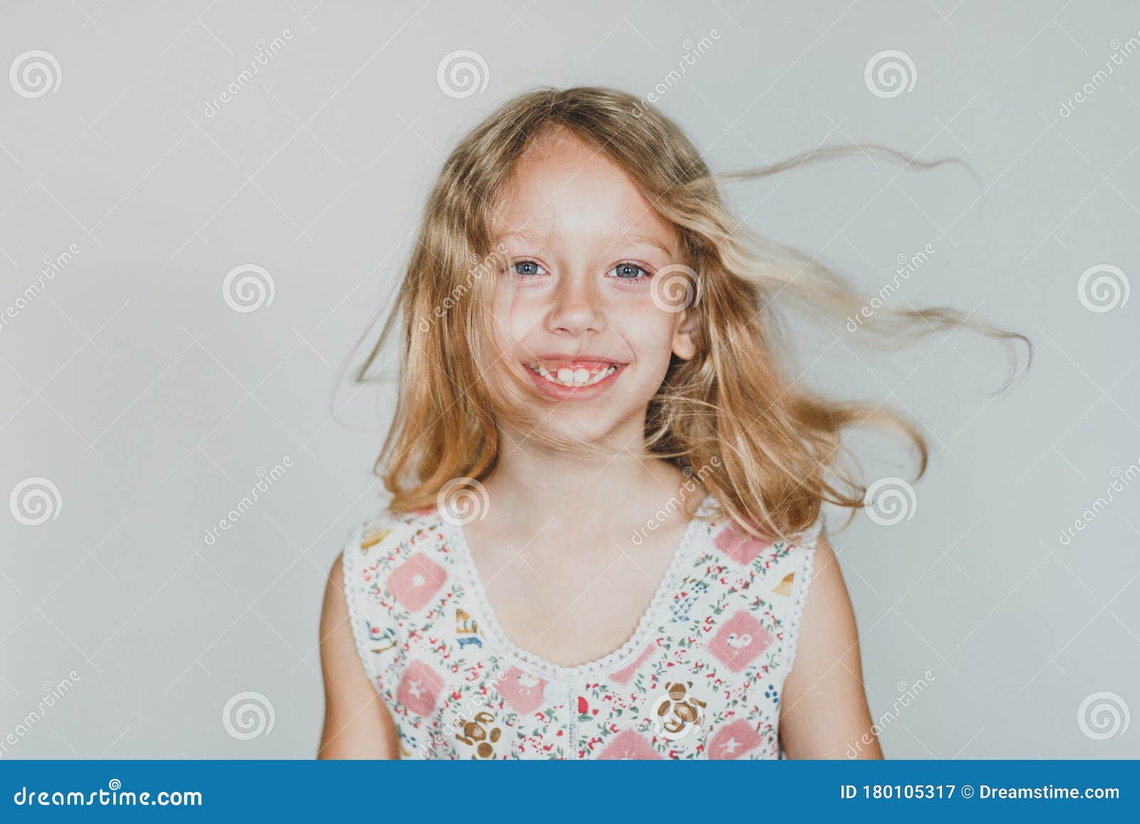 Cute European Teen Girl On A Gray Background Wild Ha