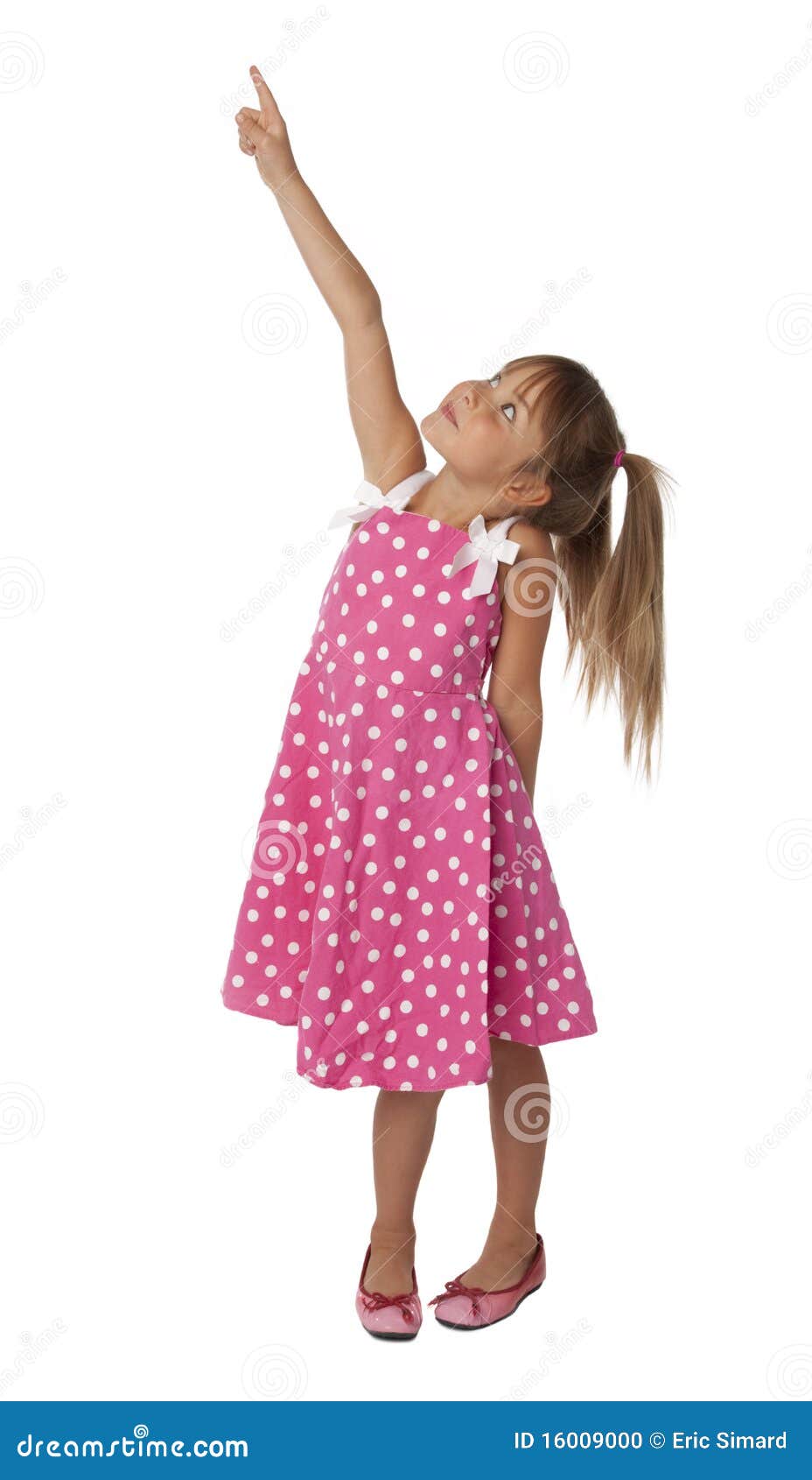 cute female child pointing upward