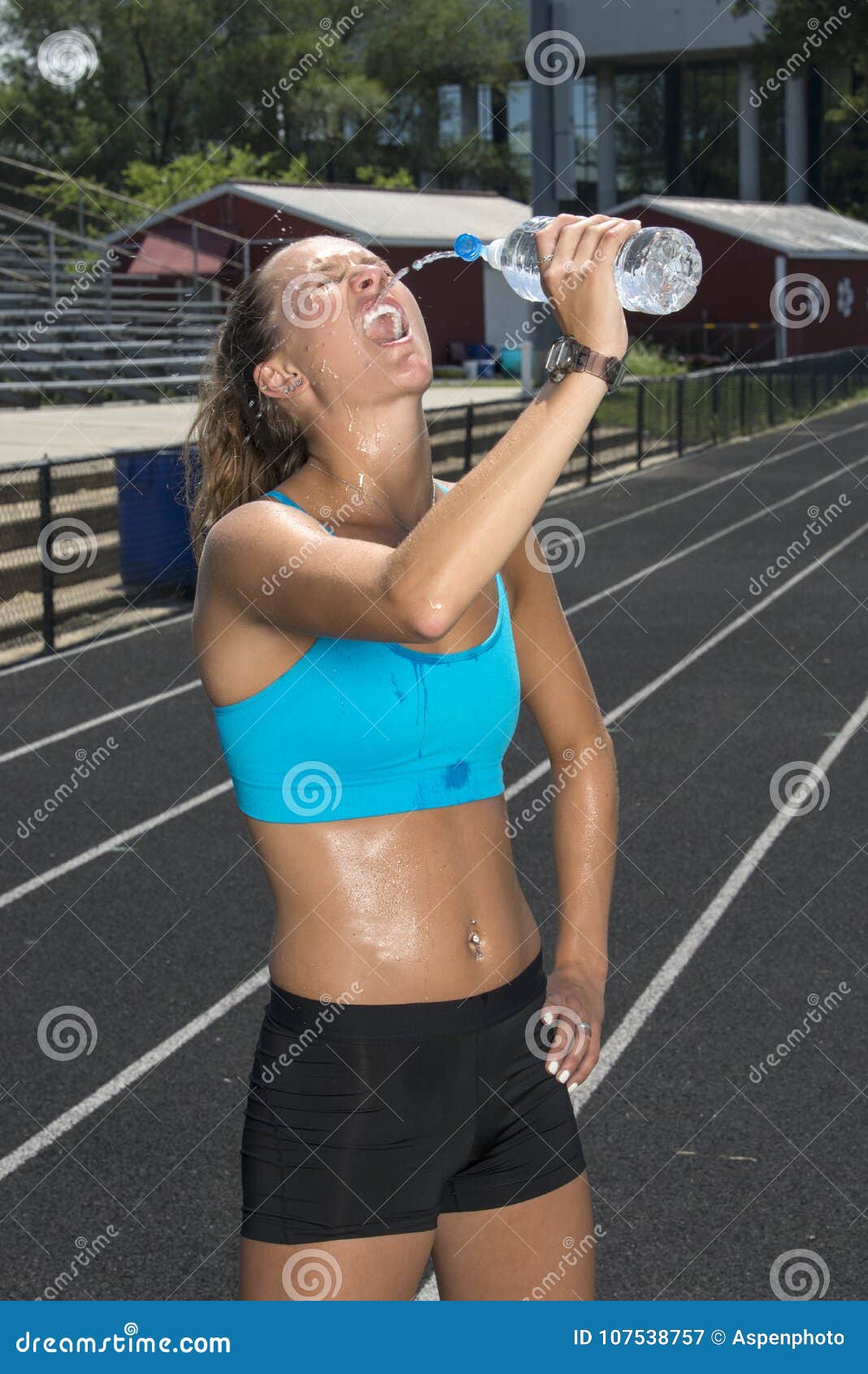 https://thumbs.dreamstime.com/z/cute-fit-young-teen-caucasian-girl-working-out-outdoor-track-glistens-sweat-blue-sports-bra-as-pours-water-her-107538757.jpg