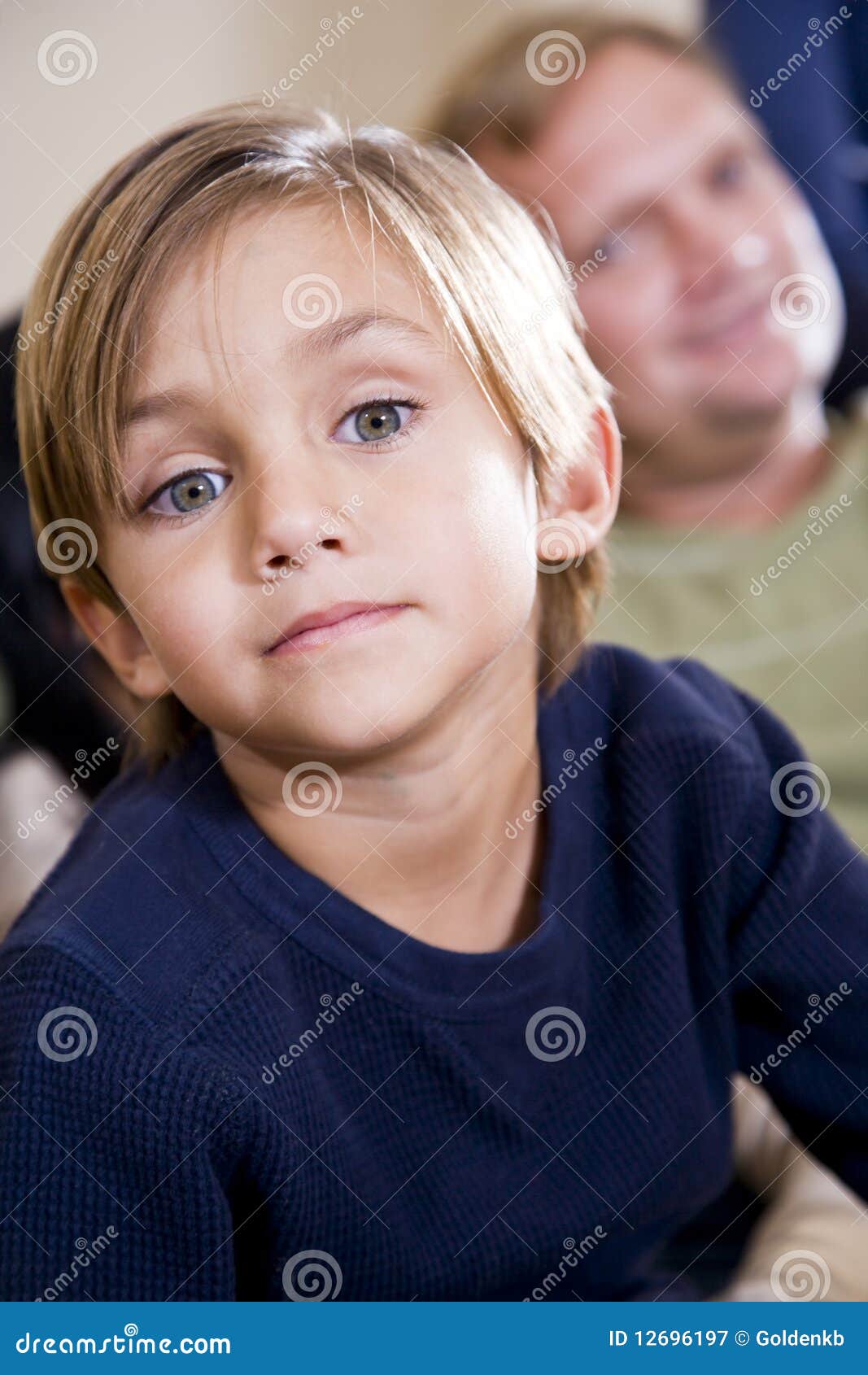 Cute Five Year Old Boy with Father in Background Stock Image Image of